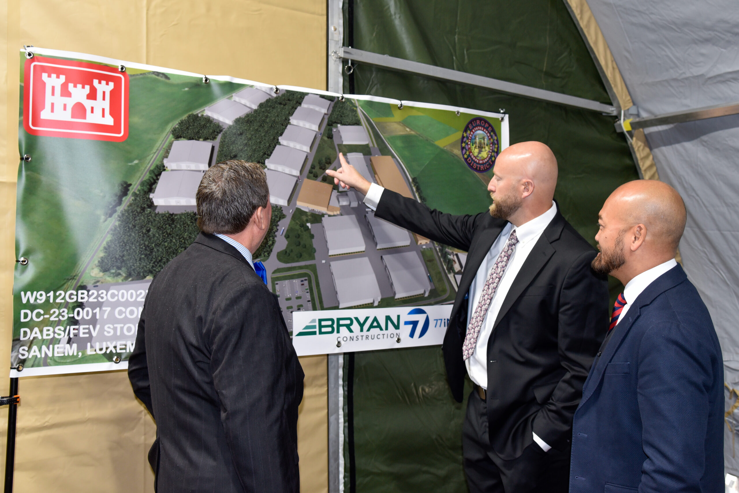 U.S. Air Force Installation and Mission Support Center Det 4 Design and Construction Chief Allan Lucht, Det 4 Project Manager Ned Harshbarger and U.S. Army Corps of Engineers, Europe District Project Manager Khang Ho discuss the Deployable Air Base System support and storage facilities being built at the Warehouses Service Agency complex in Sanem, Luxembourg before a groundbreaking ceremony for the project October 19, 2023. The project represents $100 million (€95 million) U.S. investment via the European Deterrence Initiative and will add more than 200,000 square feet of additional facility space to the WSA site, which is already the U.S. Air Forces in Europe’s largest depot on the continent. The project supports the readiness and responsiveness of the U.S. Air Forces in Europe, reinforcing NATO’s collective defense and deterrence. (U.S. Army photo by Chris Gardner)