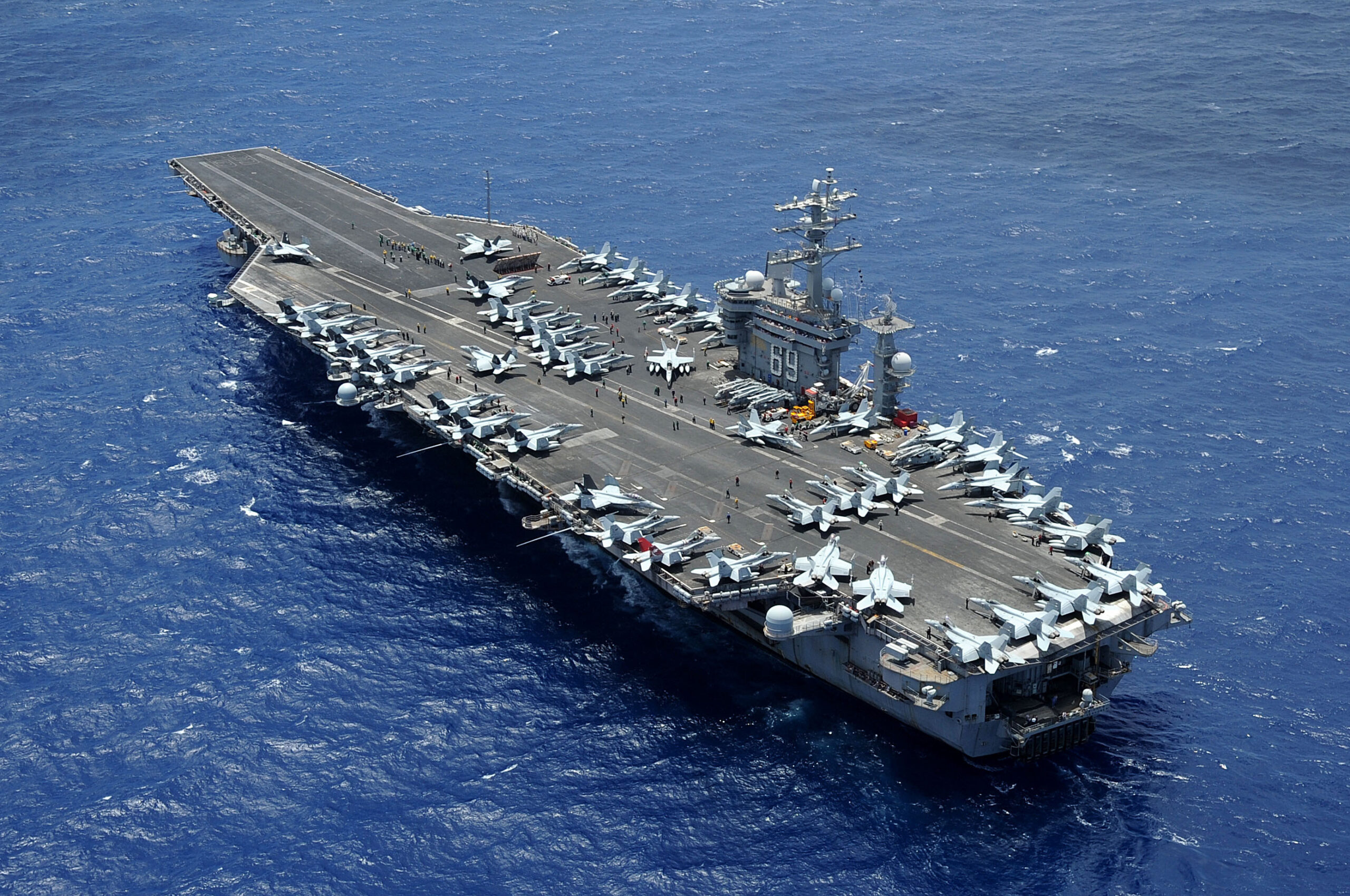 The aircraft carrier USS Dwight D. Eisenhower (CVN 69) transits the Atlantic Ocean. Dwight D. Eisenhower is returning to homeport at Norfolk, Va. after operating in the U.S. 5th and 6th Fleet areas of responsibility in support of Operation Enduring Freedom, maritime security operations and theater security cooperation efforts. (U.S. Navy photo by Mass Communication Specialist 2nd Class Ryan D. McLearnon/Released)