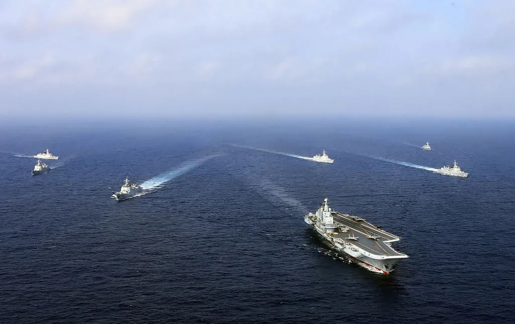 China's aircraft carrier the Liaoning sails with other ships