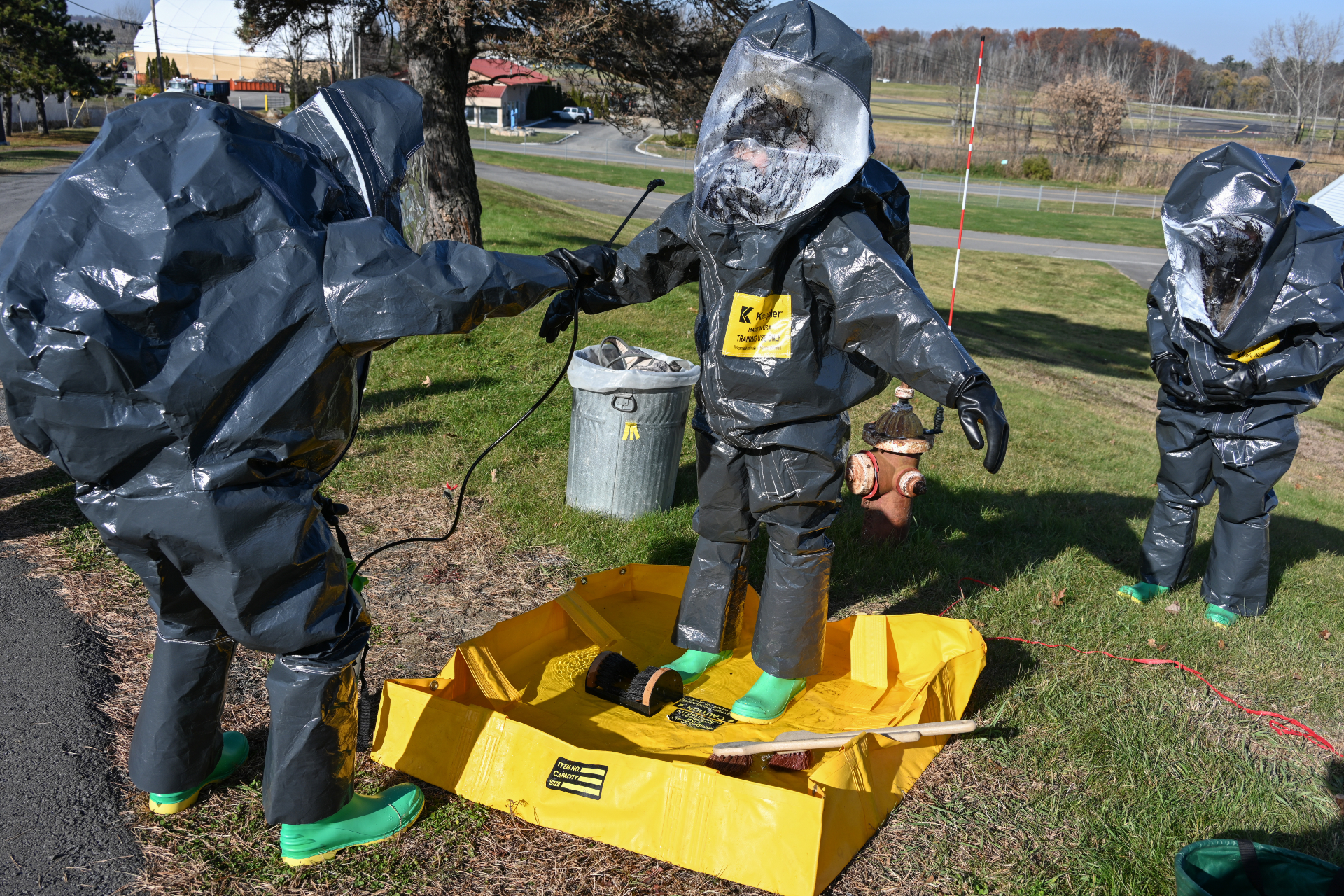 Sgt Craig Roebuck and Spc Minji Kang, survey team members from the Dismounted Chemical Reconnaissance Platoon, 10th Mountain Division participate in a training exercise at the Colonie Fire Training Center in Latham, NY, Nov 17th. During the exercise, Chemical, Nuclear, Radioactive, and Nuclear (CBRN) Specialists from Fort Drum went through training scenarios designed to familiarize them with certain equipment, expand their knowledge in responding to a CBRN situation, and to build a relationship with the New York National Guard's 2nd Civil Support Team, whose members were present to facilitate the training and offer support and mentorship. (New York National Guard photo by SSG Matthew Gunther)