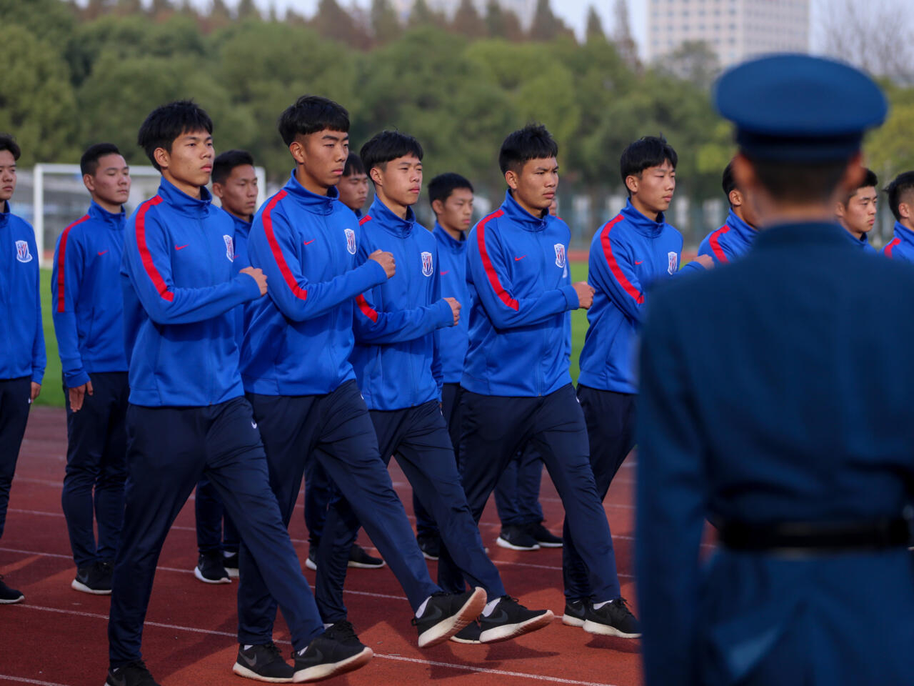 Shanghai Shenhua youth football players undergoing military training