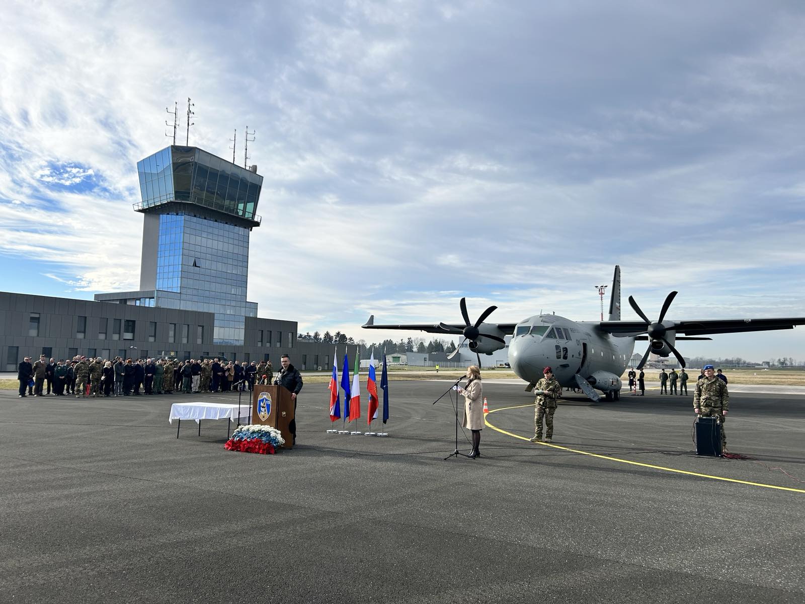 Slovenian defense officials and military personnel accept first C-27J Spartan aircraft at the Cerklje ob Krki airfield in Brežice