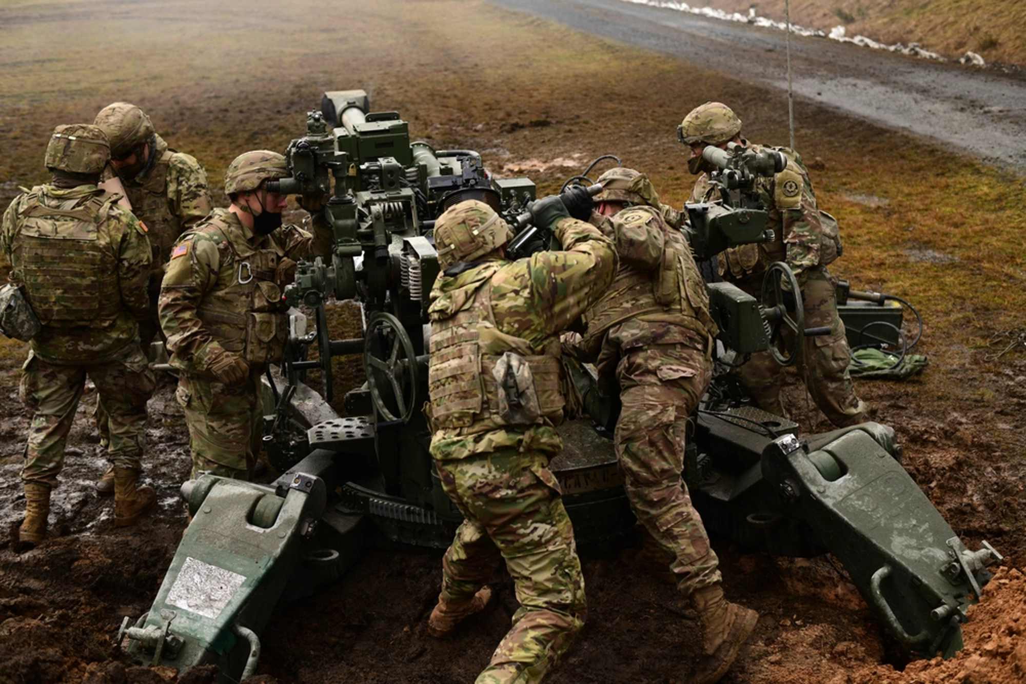U.S. Soldiers assigned to Cobra Battery, Field Artillery Squadron, 2nd Cavalry Regiment, conduct a direct fire exercise with M777 Howitzers, Grafenwoehr Training Area in Bavaria, Germany, Feb. 04 2021. (U.S. Army photo by Kevin Sterling Payne)