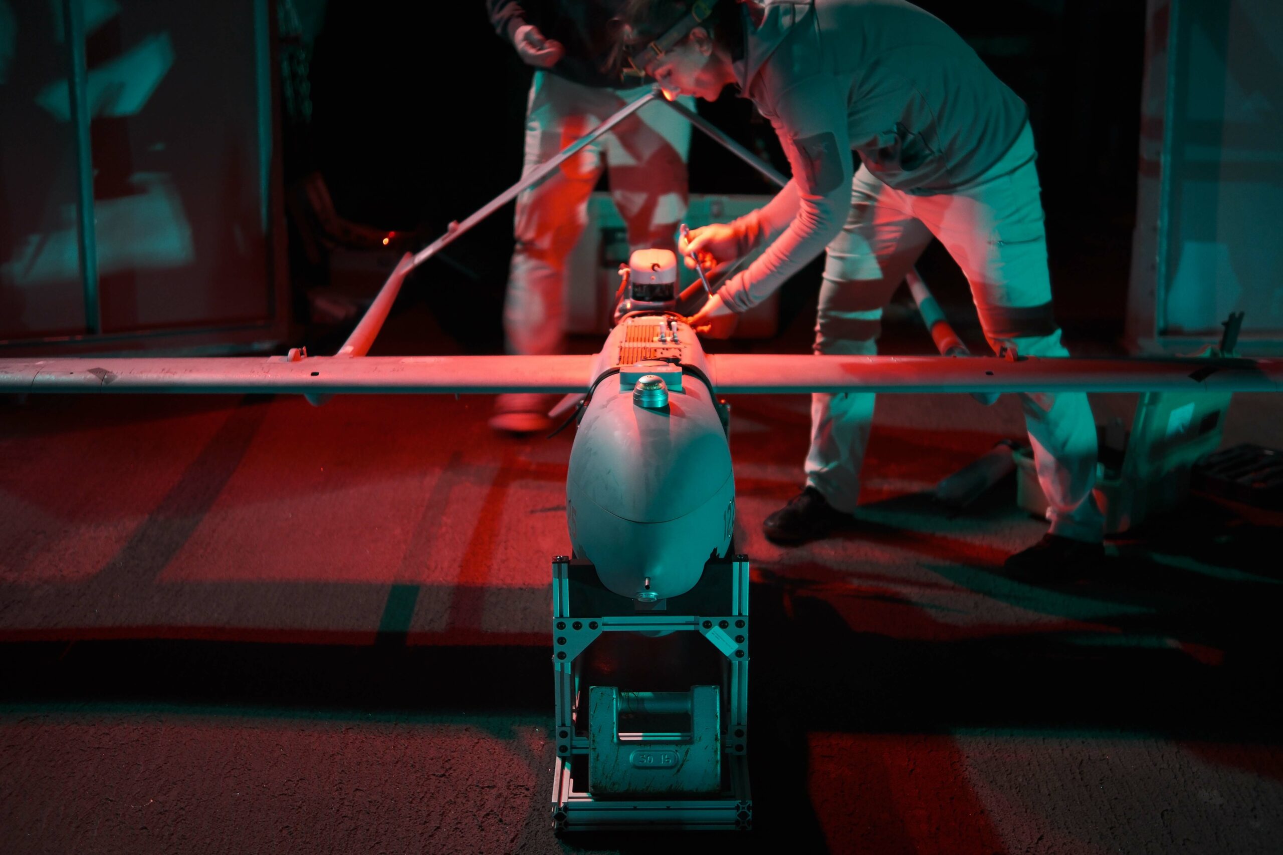 PHILIPPINE SEA (Nov. 20, 2022) – Aerosonde unmanned aerial vehicle (UAV) operators assigned to the Arleigh Burke-class guided-missile destroyer USS Milius (DDG 69) conduct post-flight checks on a UAV. Milius is assigned to Commander, Task Force 71/Destroyer Squadron (DESRON) 15, the Navy’s largest forward-deployed DESRON and the U.S. 7th Fleet’s principal surface force. (U.S. Navy photo by Sonar Technician Surface Second Class Lucas Daehan Yun)