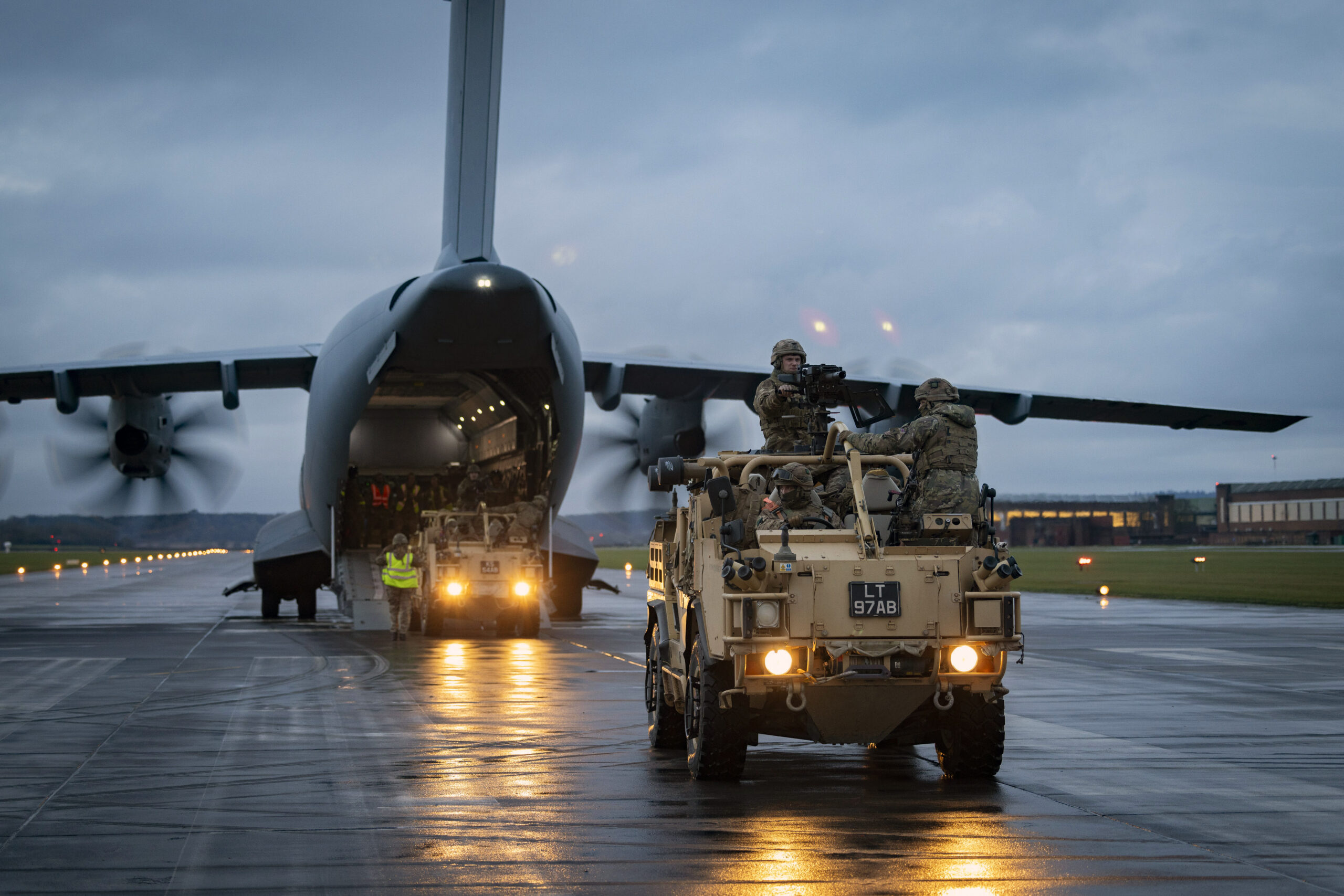 Jackal 2 Reconnaissance vehicles and their crew from the 1st Battalion, The Royal Irish Regiment, drove off the Royal Air Force (RAF) ATLAS C.1 (A400M) aircraft after a Rapid Air Landing (RAL) at RAF Shawbury on Exercise Pegasus Clover on the 12th of December 2023. 1st Battalion The Royal Irish Regiment (1 R IRISH) worked with an RAF ATLAS C.1 aircraft at RAF Shawbury to develop their airlanding skills. Troops loaded and secured Land rovers on the aircraft, and then took flight to practise getting off the aircraft and into the fight as fast as possible. The skills learnt on Exercise Pegasus Clover are vital for the unit in its role in 16 Air Assault Brigade, the British Army’s global response force. The brigade is trained and equipped to be ready to deploy by air at short notice to respond to international crises, from evacuations to warfighting. 1 R IRISH, based at Clive Barracks in Tern Hill, serves in 16 Air Asslt Bde as light recce strike infantry, a new concept that the unit is currently developing. The intent is to provide a highly mobile force that can seek out battle winning information, while having the firepower to hit the enemy hard. It has the flexibility to deploy onto operations by airlanding or driving, as well as conducting helicopter operations.