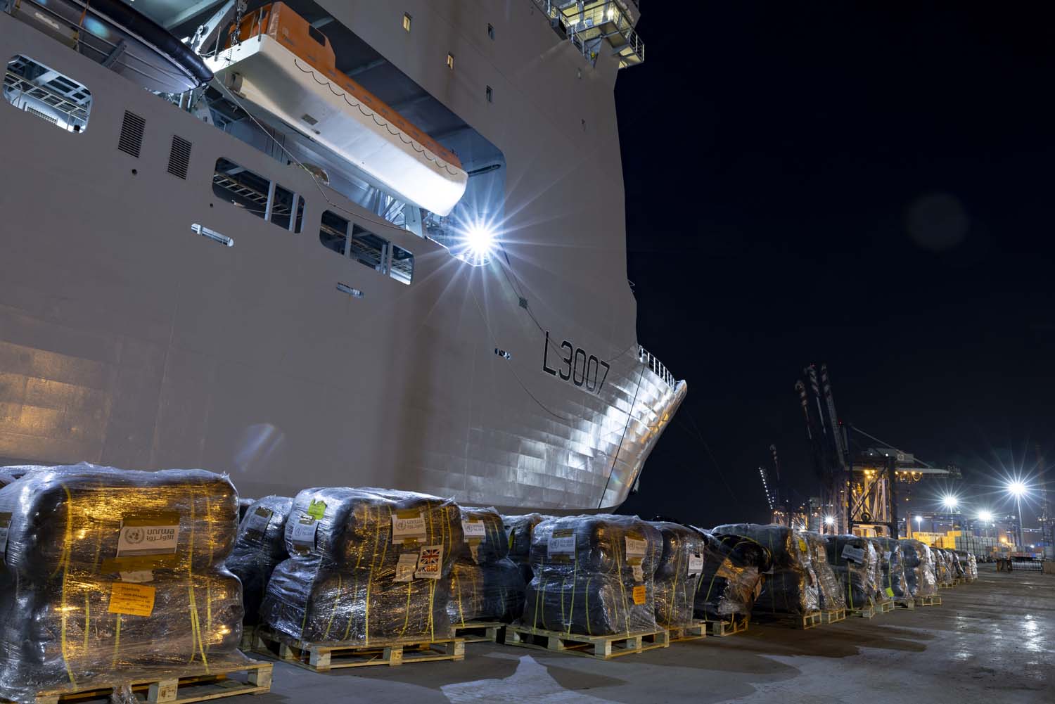 RFA Lyme Bay has delivered over 80 tonnes of humanitarian aid for Gaza into Port Said, Egypt. The aid was handed to the Egyptian Red Crescent Society for transfer to Rafah and distribution in Gaza by the United Nations Relief and Works Agency (UNRWA). The ship, operated by the Royal Fleet Auxiliary - the Royal Navy’s vital support flotilla - delivered over 300 pallets, containing over 10,000 thermal blankets and nearly 5,000 shelter packs, of UK Aid on behalf of the Foreign, Commonwealth and Development Office, as well as 11 pallets of medical aid on behalf of the Republic of Cyprus. RFA Lyme Bay is deployed to the Eastern Mediterranean, alongside RFA Argus, as part of Littoral Response Group (South).