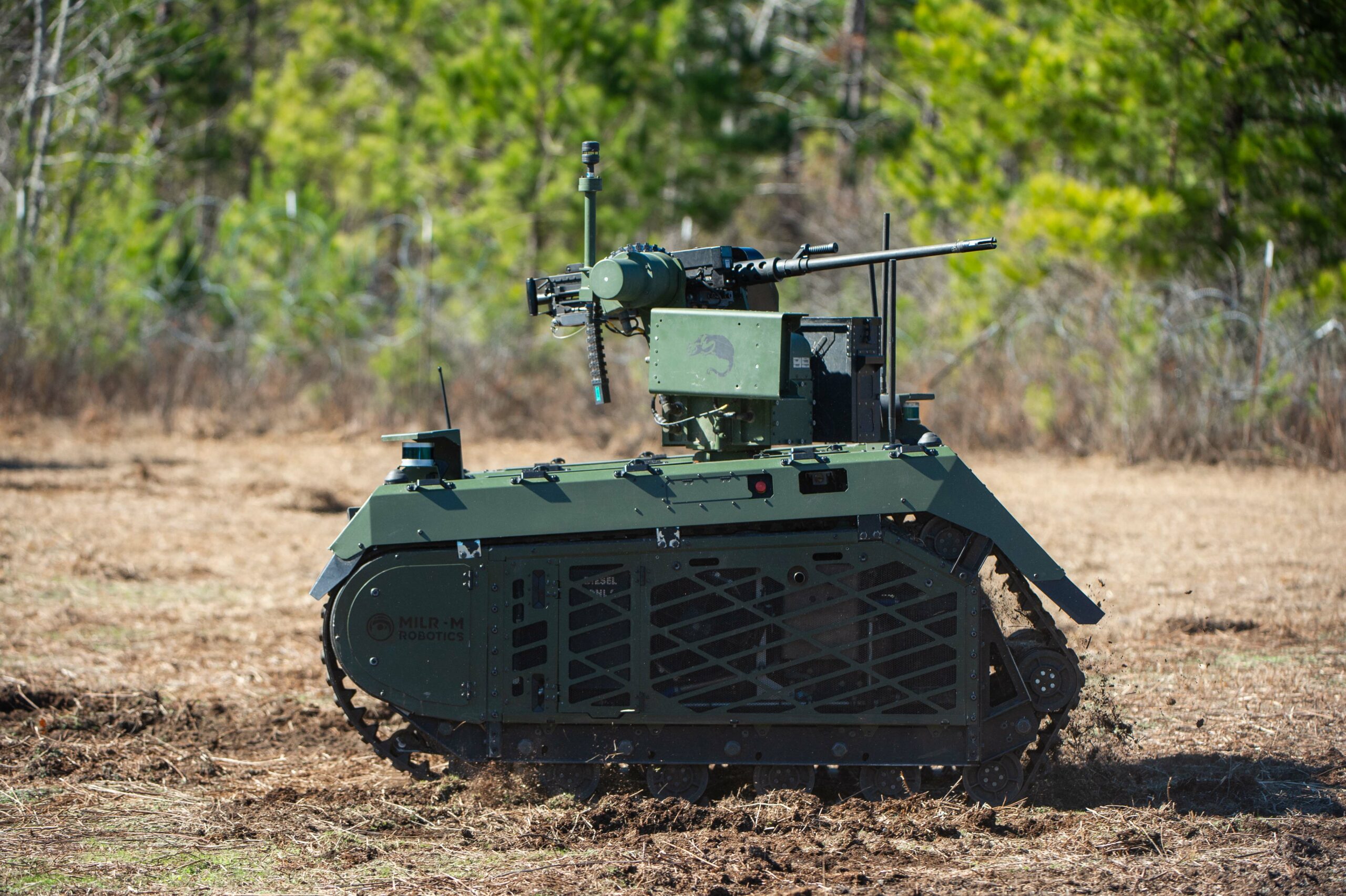 The Milrem THeMIS, a Dutch and German ground-based system combining an unmanned ground vehicle (UGV) and a remote-controlled weapon station designed to enhance the firepower of dismounted units, participates in the 2024 Army Expeditionary Warrior Experiment Jan. 29, 2024, at McKenna Range, Fort Moore, Ga.