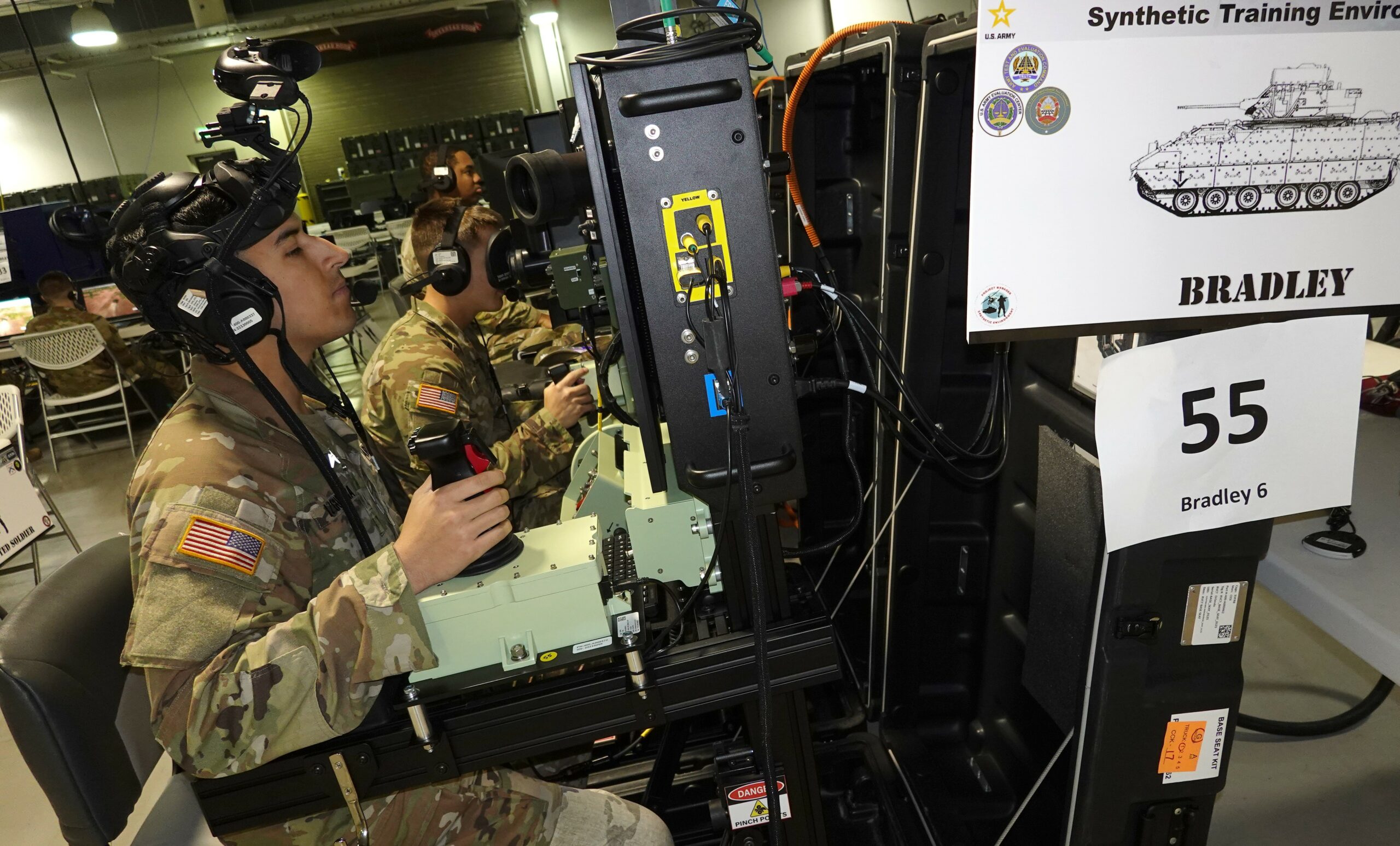 Sgt. Andreis I. Izguerra, a cavalry scout with 4th Squadron, 9th Cavalry Regiment, 2nd Armored Brigade Combat Team, 1st Cavalry Division, operates a Bradley combat vehicle in a tactical combat simulator as he contributes to the operational demonstration of the Army’s new Synthetic Training Environment system, as part of the Reconfigurable Virtual Collective Trainer, at Fort Cavazos, Texas. He was then able to provide feedback to help the Army decide the future of STE. (Mr. Michael M. Novogradac, U.S. Army Operational Test Command public affairs officer)