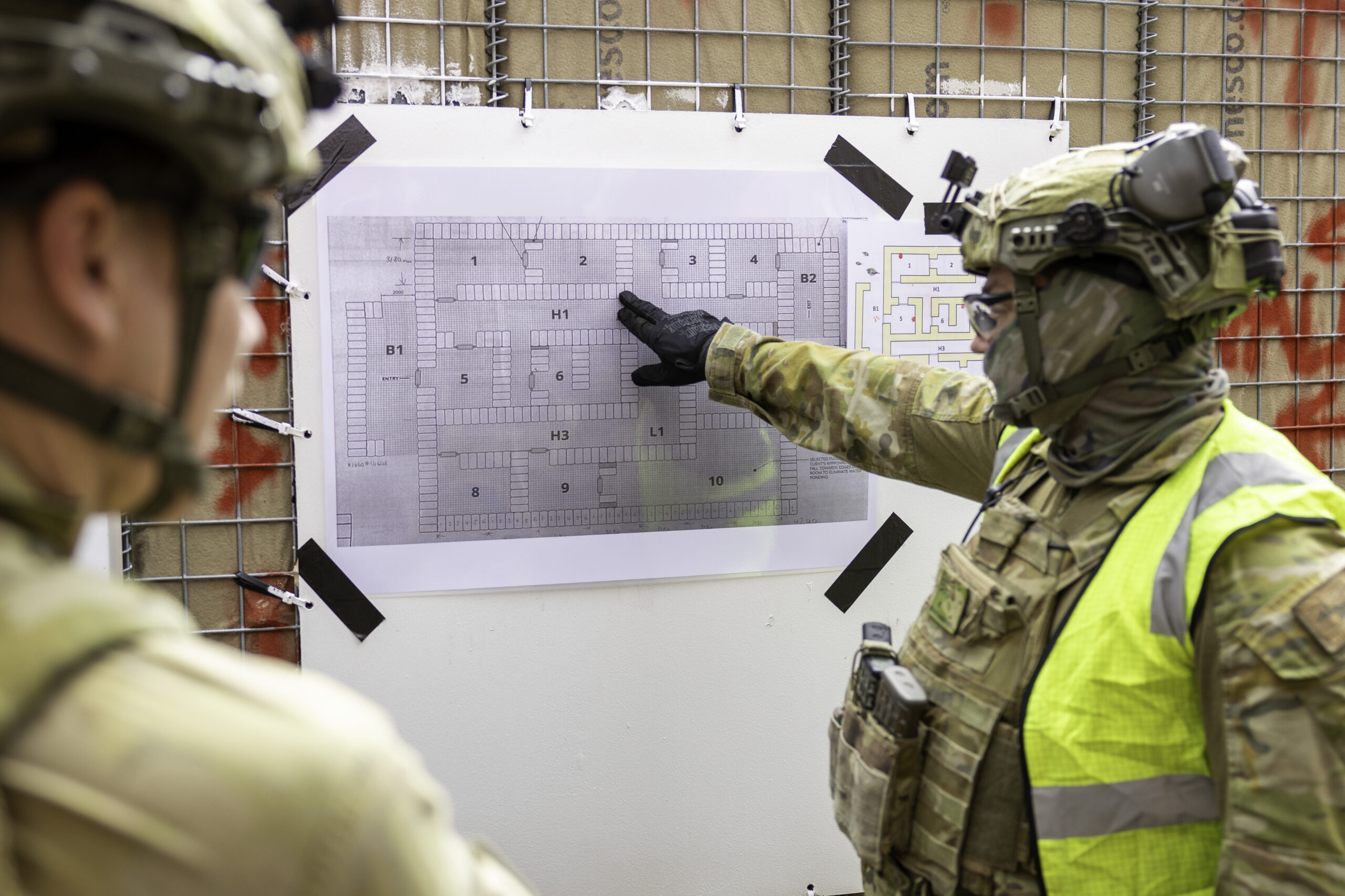 Australian Army soldiers form the 6th Battalion, The Royal Australian Regiment conduct urban live-fire training at Greenbank Training Area.