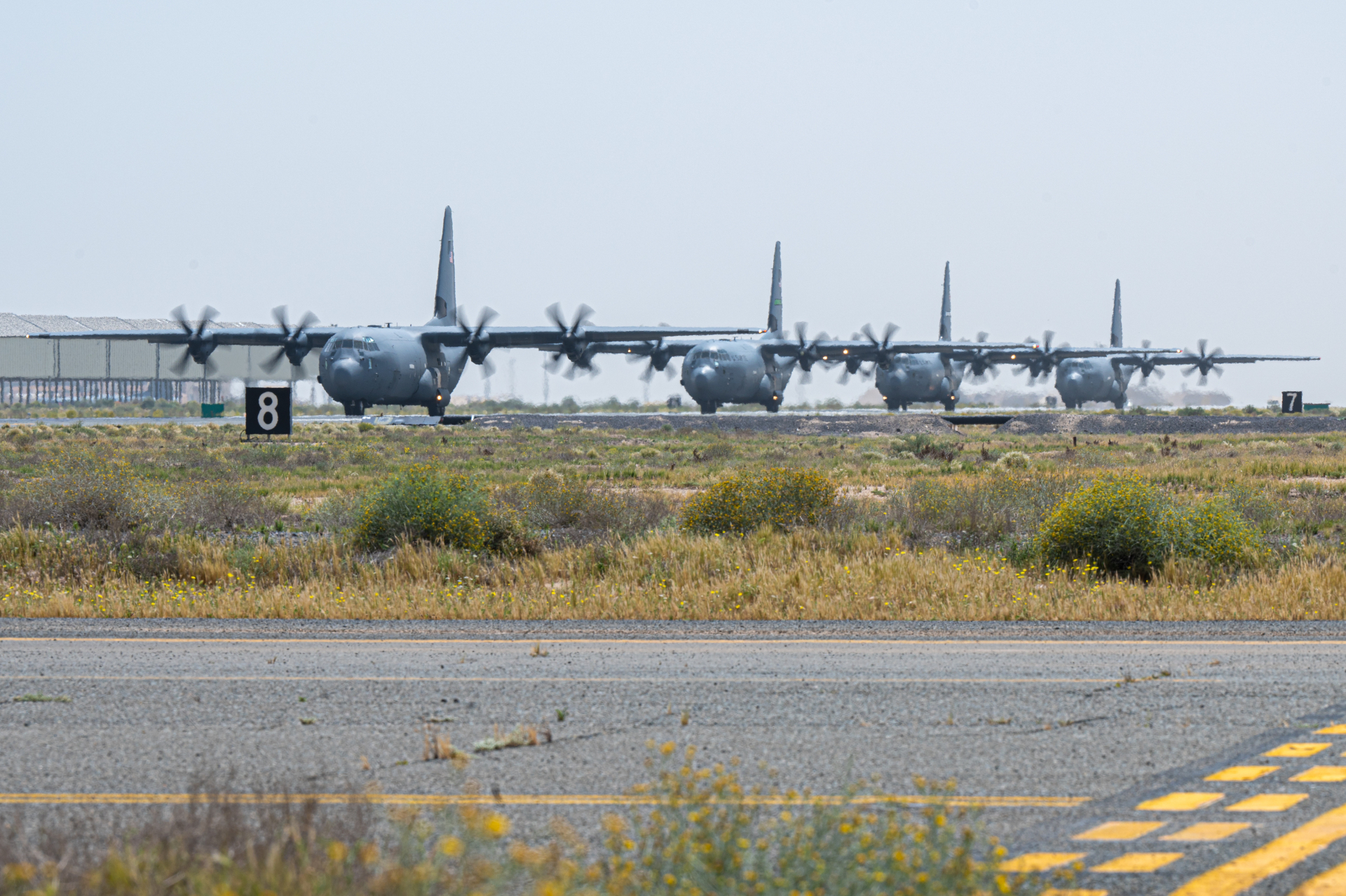Four U.S. Air Force C-130J Super Hercules aircraft loaded with humanitarian aid bound for airdrop over Gaza take off from an undisclosed location in Southwest Asia, March 9, 2024. The U.S. humanitarian assistance included more than 41,400 meals ready-to-eat and 23,000 bottles of water destined for civilians in Gaza affected by conflict in the region. (U.S. Air Force photo)