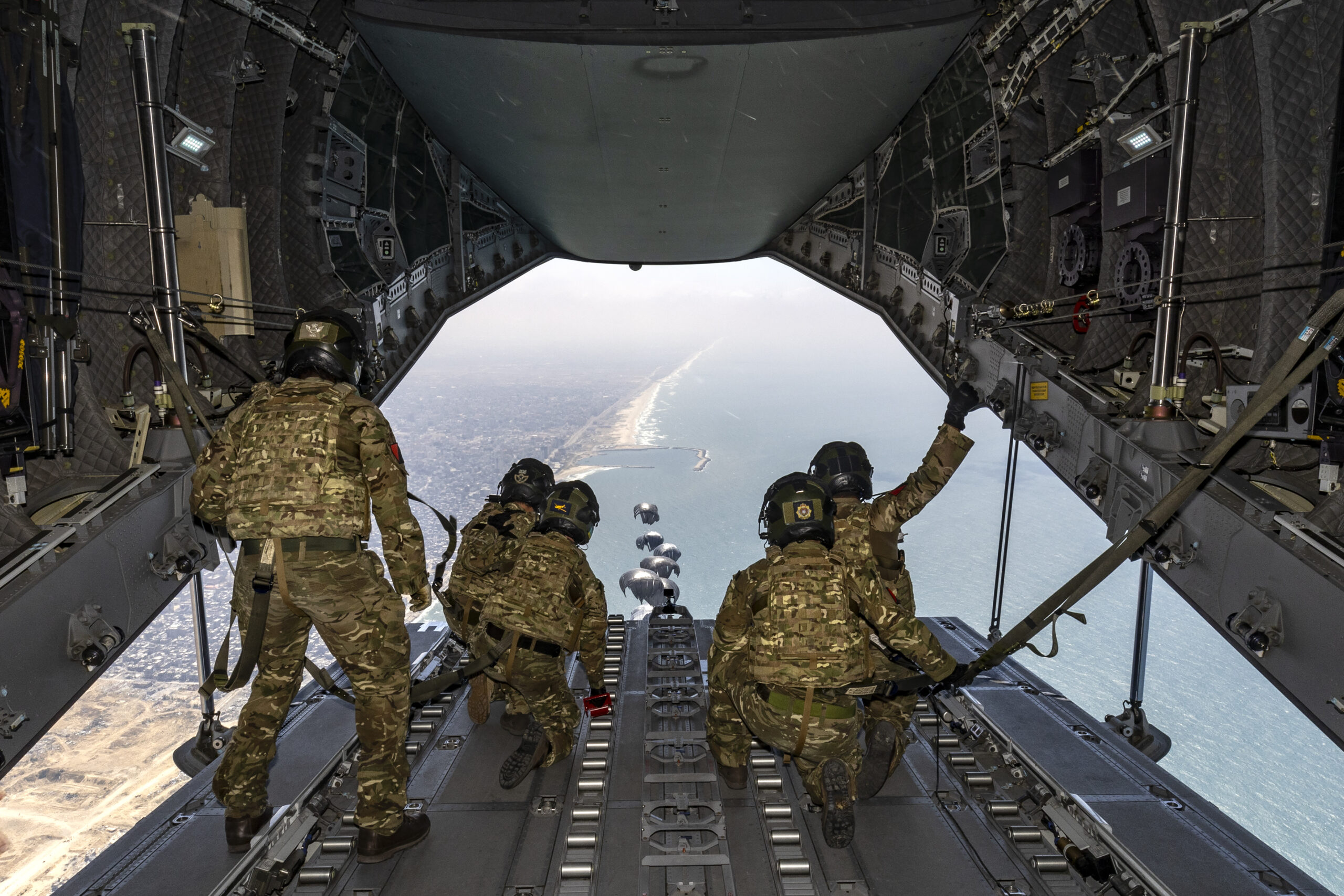 On 09 April 2024, UK Armed Forces load Container Delivery Systems (CDS) with Humanitarian Aid as part of the action to address the plight of the Palestinian people. Army personnel from 47 Air Despatch Squadron load aid from Jordan and the UK onto an RAF A400M Atlas from RAF Brize Norton. 12000 Kgs of aid was dropped into Northern Gaza after an assessed reduction in threat to the military mission and risk to civilian life. The Royal Air Force participated in a large-scale international aid airdrop into Gaza on Tuesday (9 April 2024) to coincide with Eid al-Fitr, marking the end of Ramadan. This was the largest airdrop of aid into Gaza on a single day and the culmination of careful planning alongside international partners to ensure the complex mission could be conducted safely and effectively. Led by the Jordanian Armed Forces, the international operation saw 10 nations and 16 aircraft (to check)  including UK, Germany, Egypt, the United Arab Emirates, the United States and Jordan (to check)  drop essential aid.