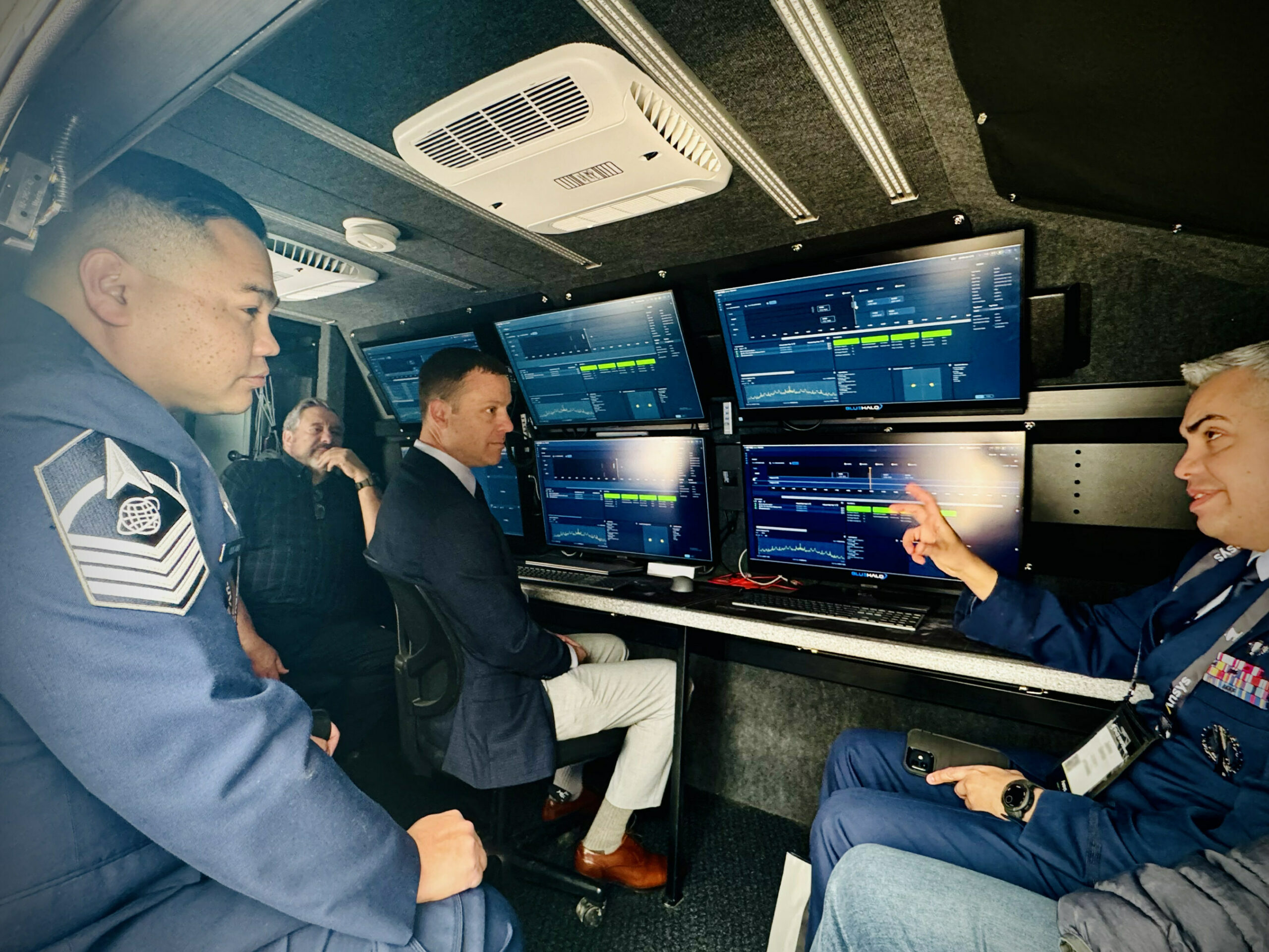 USSF Guardians get a first look at the SCAR system’s backend mission services inside the BlueHalo mobile command center during Space Symposium 2024 in Colorado Springs, CO.