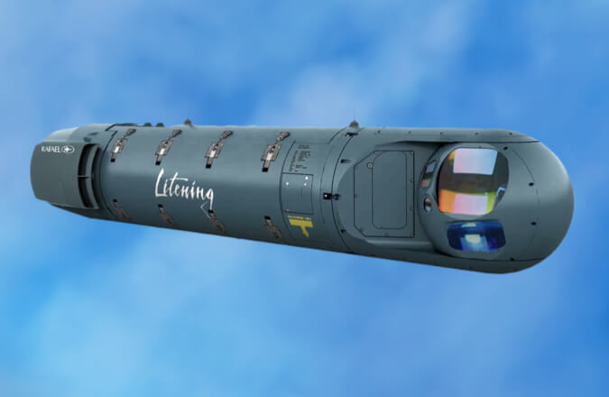 A LITENING 5 Target Pod. The capsule-shaped targetting system is painted gray-green and has 