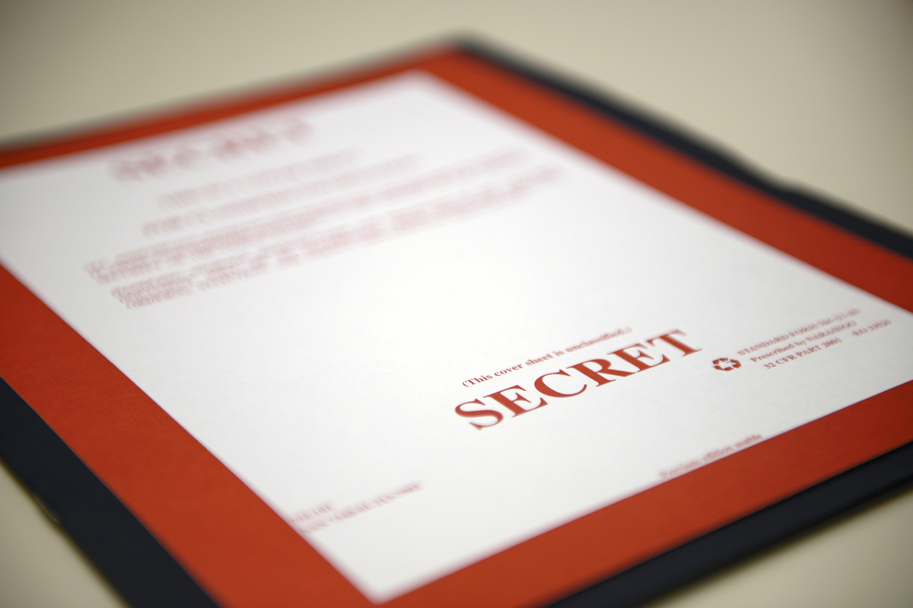 A “secret” cover sheet typically designates a folder that contains classified material that can be viewed only by those with proper clearance. This folder contains no classified material, however, and the cover sheet itself is unclassified.
