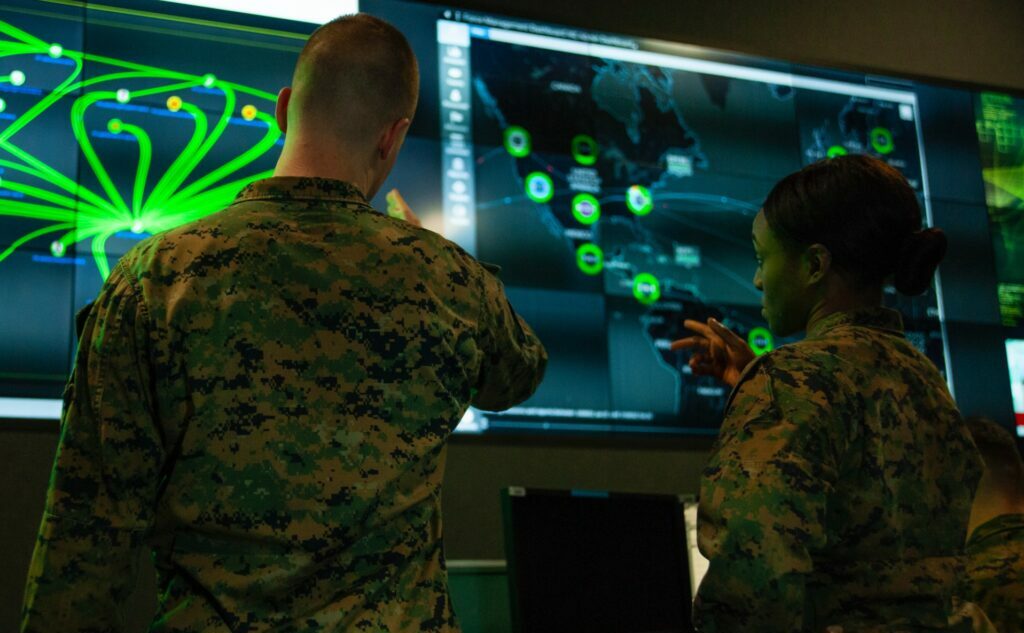 Soldiers analyzing data