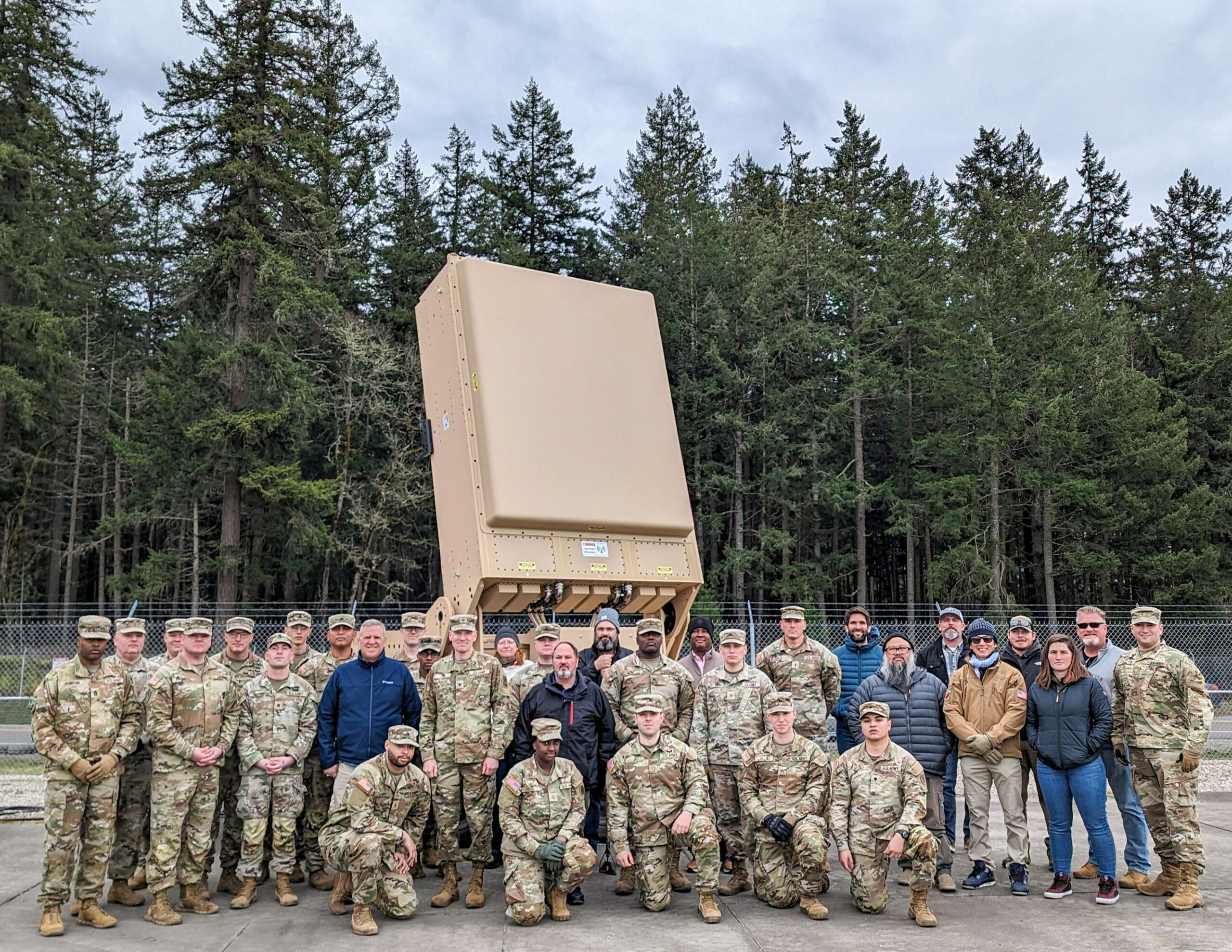 Soldiers from the U.S. Army’s Air Defense Artillery community stand in front of the IFPC-HPM system alongside Epirus support staff following New Equipment Training in March. The Soldiers here will eventually take possession of the four delivered IFPC-HPM systems to operate this capability.