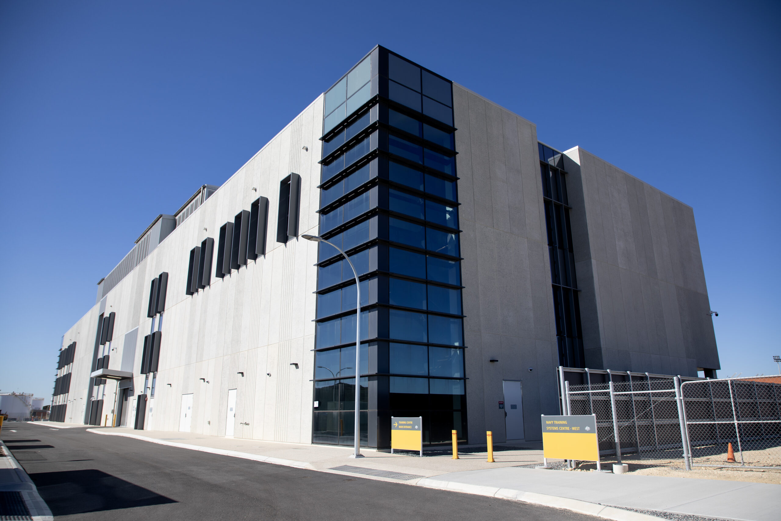 Navy Training Systems Centre-West building at HMAS Stirling, Western Australia. *** Local Caption *** The new Navy Training Systems Centre - West (NTSC-W) was officially opened on Wednesday, May 15 at HMAS Stirling, WA. The new training building will provide students based in the west with access to specialist and simulated systems training facilities without having to travel to the east coast. The NTSC-W opening was attended by Commodore Training, John Stavridis, CSC, RAN, who unveiled the official plaque and Commanding Officer HMAS Stirling, Captain Ken Burleigh, ADC, RAN.
