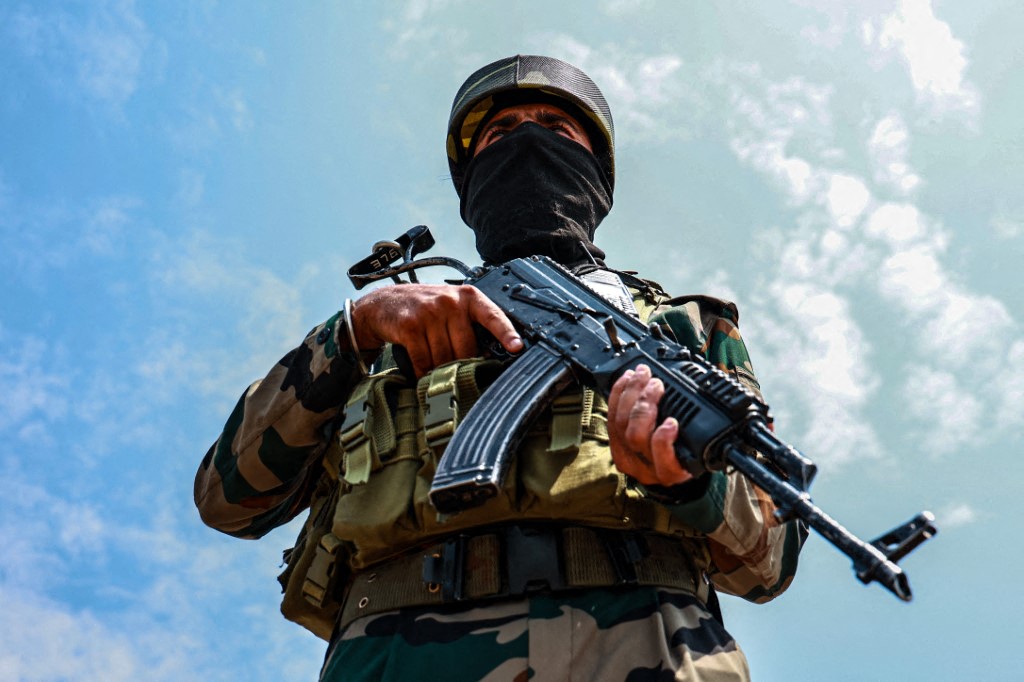 Indian Army soldiers are patrolling with AK-47 weapons in Baramulla, Jammu and Kashmir, India