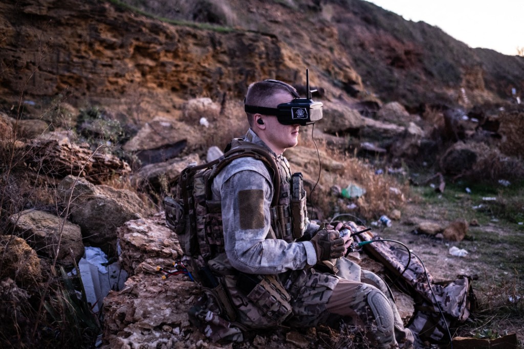 Ukrainian soldier testing his first-person view drone in a training field in Kherson region