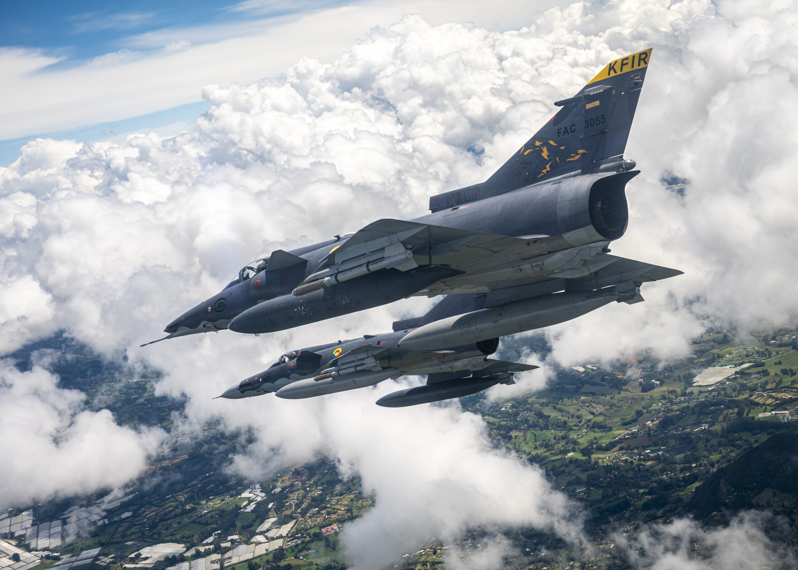 Colombian Air Force Kfirs fly over Colombia during Exercise Relampago VI, July 26, 2021. Relampago VI is a combined Colombian and U.S. exercise taking place in the U.S. Southern Command (SOUTHCOM) theater that focuses on techniques, tactics and procedures to strengthen the longstanding partnership between our armed forces. (U.S. Air Force photo by Senior Airman Duncan C. Bevan)