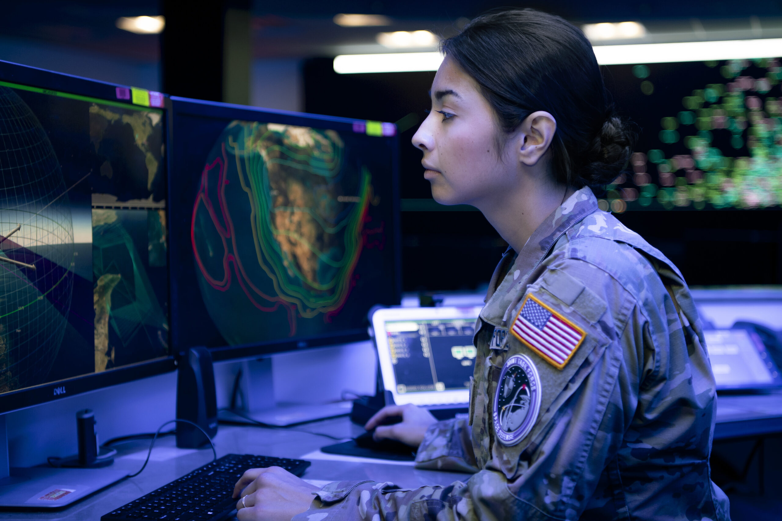 U.S. Space Force 1st Lt. Tia Scoggan, weapons and tactics section chief for the 18th Space Defense Squadron Det. 1, looks at a computer screen at Schriever Space Force Base, Colorado, Oct. 5, 2022. 18 SDS Det. 1 provides timely and actionable Space Domain Awareness (SDA) for emergent and existing threats that are identified by the Joint Task Force-Space Defense’s National Space Defense Center as on-orbit threats. (U.S. Space Force photo by Tiana Williams)