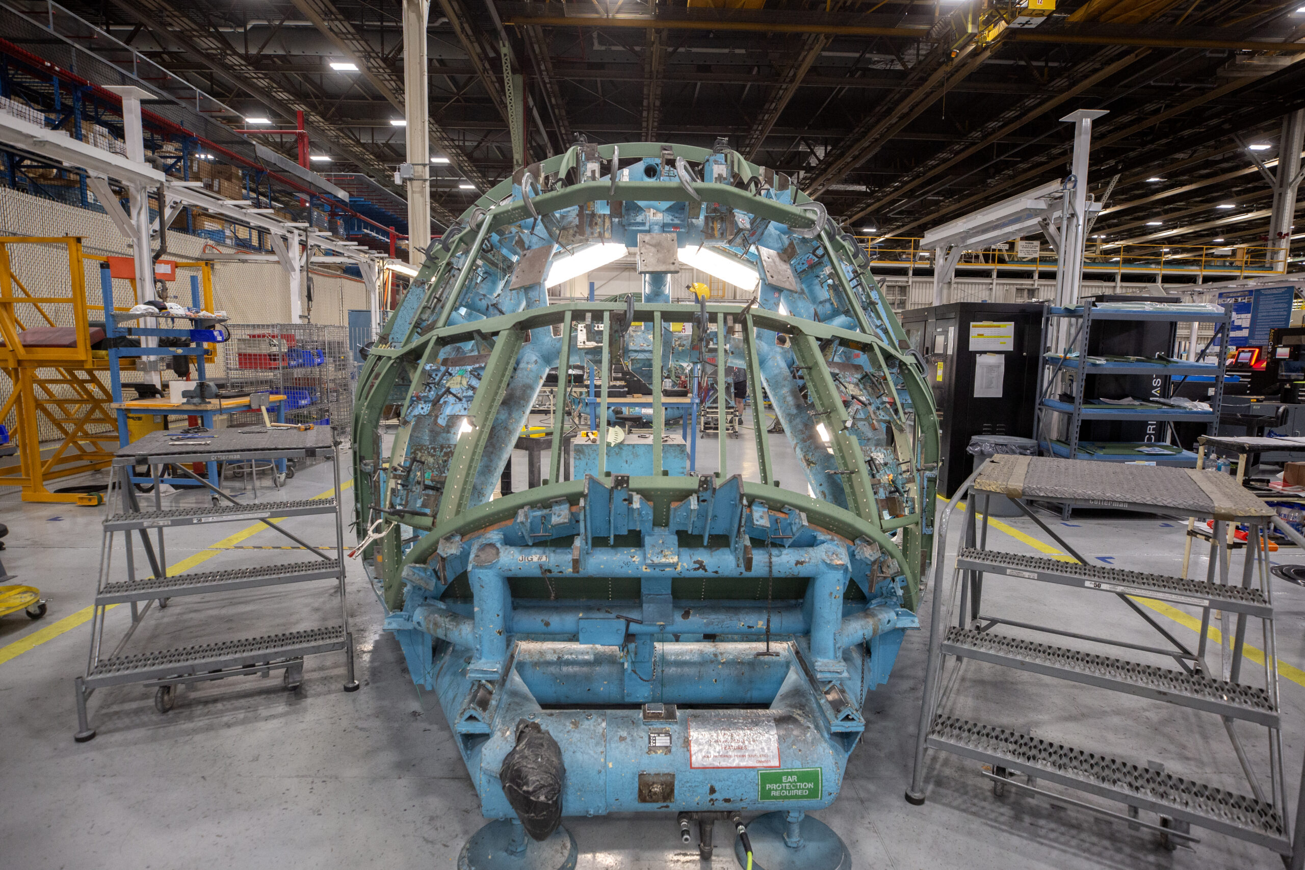 A sneak peak at the first C-130J-30 Super Hercules aircraft being built by Lockheed Martin Corp. for the U.S. Navy’s E-130J program. This aircraft – the first of three – is slated to be delivered to the government in 2026 for modification into an E-130J Engineering Development Model (EMD). The E-130J, formerly called E-XX, will be the successor to the E-6B Mercury for the Take Charge and Move Out (TACAMO) mission, which connects the president, secretary of defense and U.S. Strategic Command with the United States’ nuclear triad. The U.S. Navy’s Airborne Strategic Command, Control and Communications Program Office (PMA-271) is leading the TACAMO Recapitalization Program and is scheduled to award the EMD contract during the first quarter of the 2025 fiscal year. (Photo by David L. Key, Lockheed Martin)