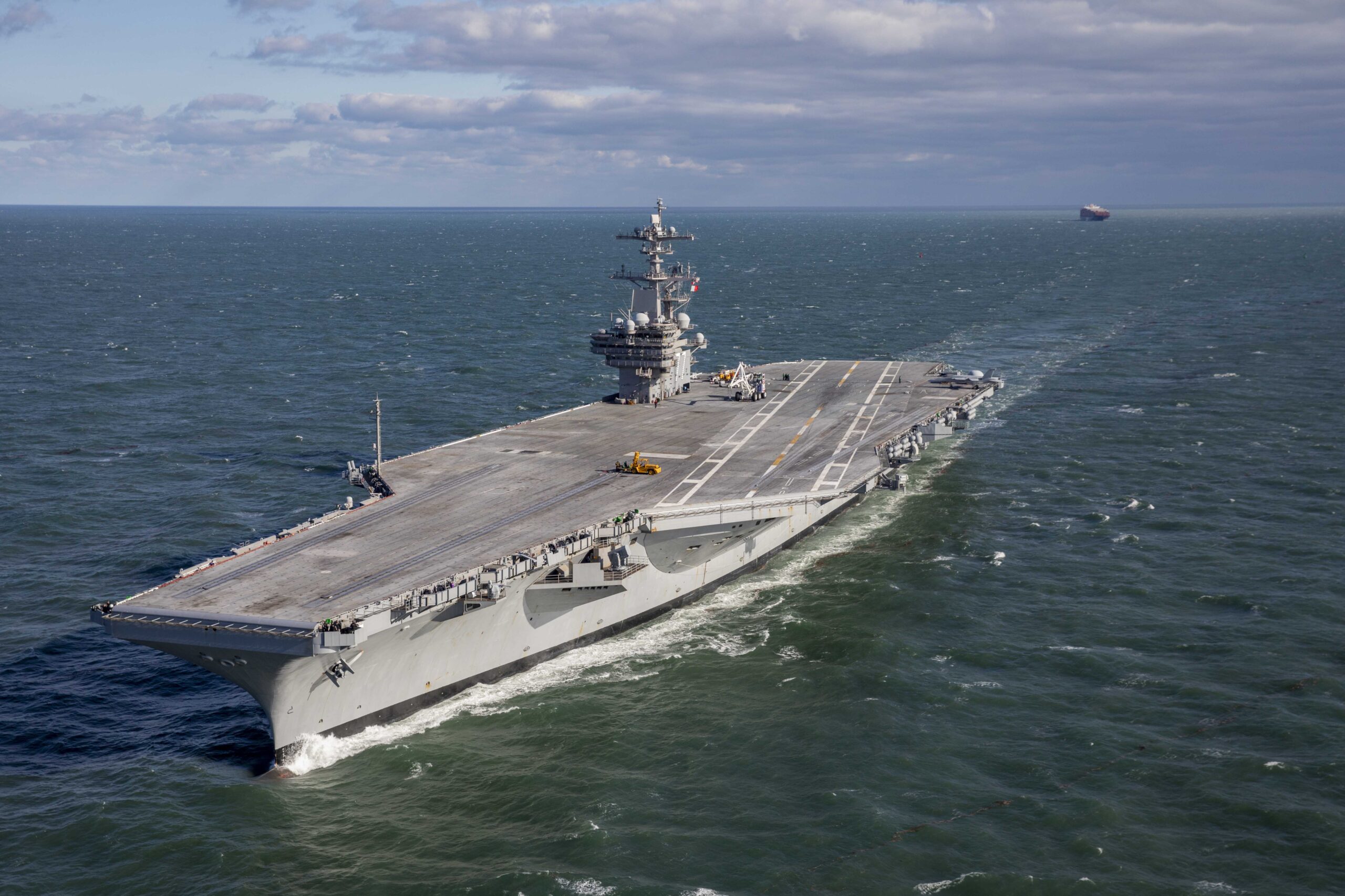 241116-N-MW880-1027 NORFOLK, Va. (Nov. 16, 2024) The Nimitz-class aircraft carrier USS George H.W. Bush (CVN 77), transits to Naval Station Norfolk after on-time completion of an 11-month maintenance period at Norfolk Naval Shipyard and sea trials, Nov. 16, 2024. USS George H.W. Bush departed Norfolk Naval Shipyard to conduct a scheduled underway to test equipment and systems in preparation for future operations and is now in the basic phase of the Optimized Fleet Response Plan. (U.S. Navy photo by Mass Communication Specialist 2nd Class Samuel Wagner)