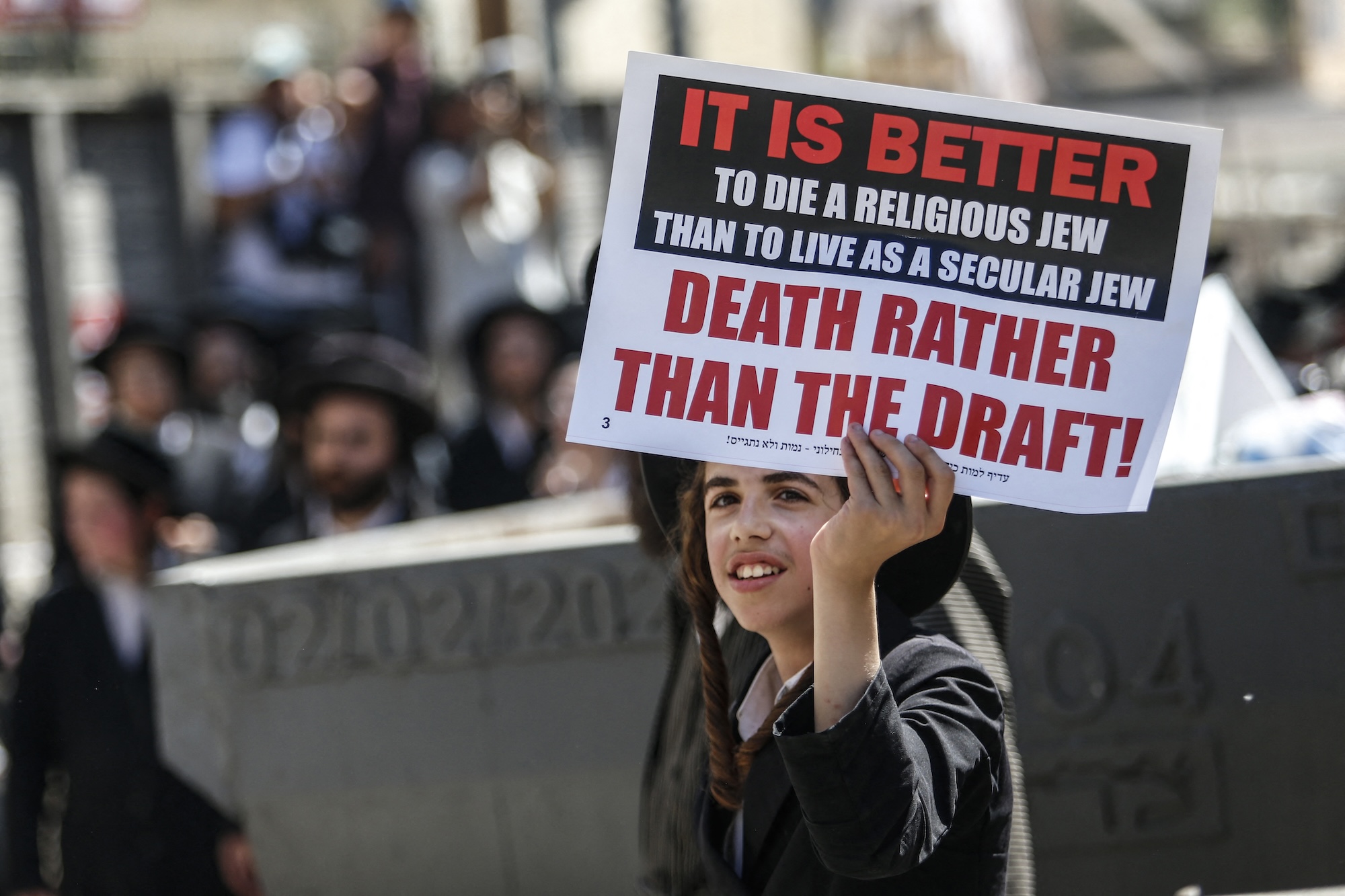 Israeli police officers intervene in Ultra-Orthodox Jews who gather to stage a protest against mandatory military service in West Jerusalem, Israel, on August 21, 2024