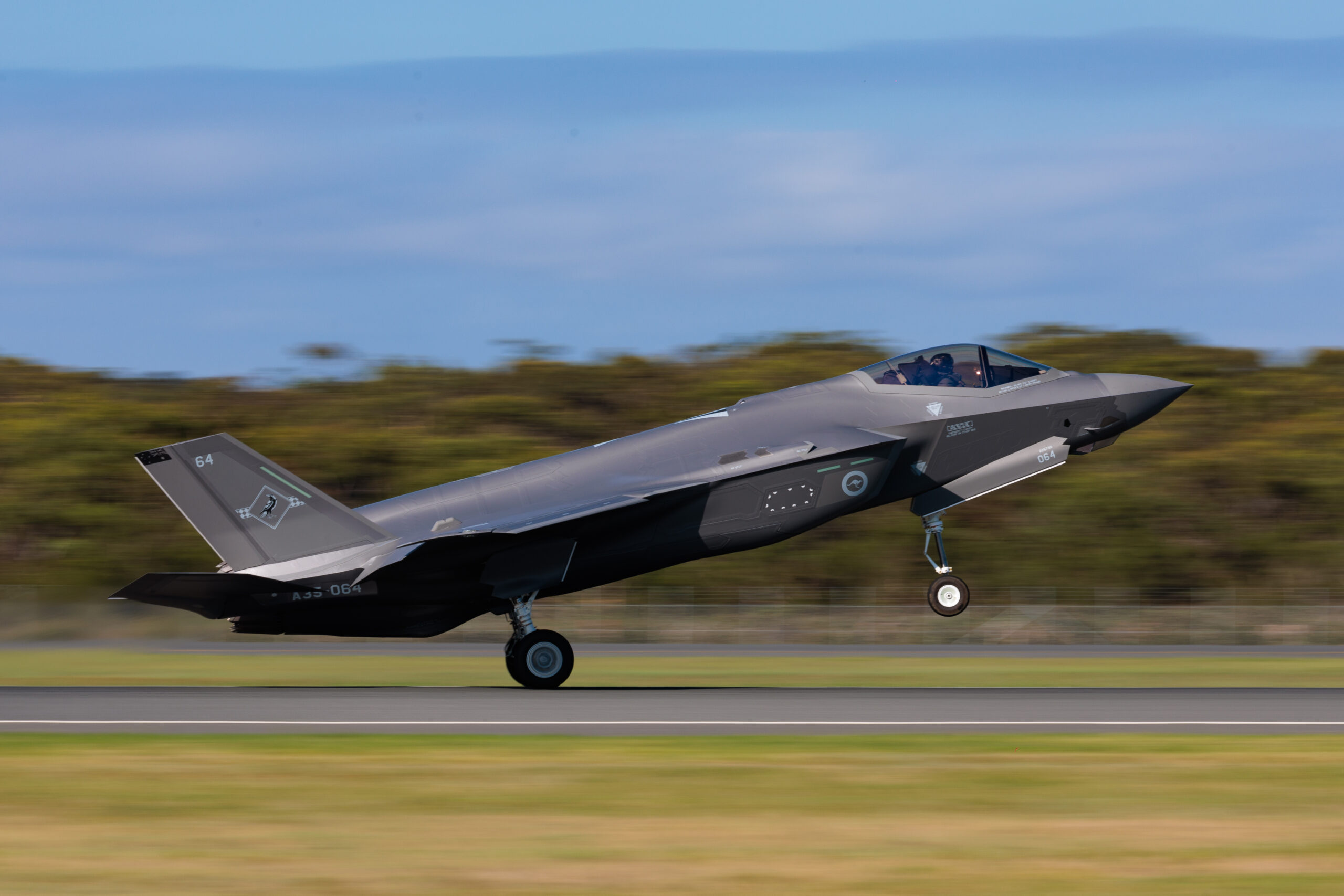 A Royal Australian Air Force F-35A Lightning II aircraft arrives at RAAF Base Williamtown, NSW. *** Local Caption *** Exercise Lightning Ferry 24 was conducted during November and December 2024, culminating with delivery of the final F-35A Lightning II aircraft to be acquired by the Air Force at RAAF Base Williamtown. The aircraft travelled from Nellis Air Force Base, in the United States of America, supported by Air Forces KC-30A Multi-Role Tanker Transport aircraft from No 33 Squadron, and a C-17A Globemaster III from No 36 Squadron. Australia has now received all of the F -35A Lightning II fleet.