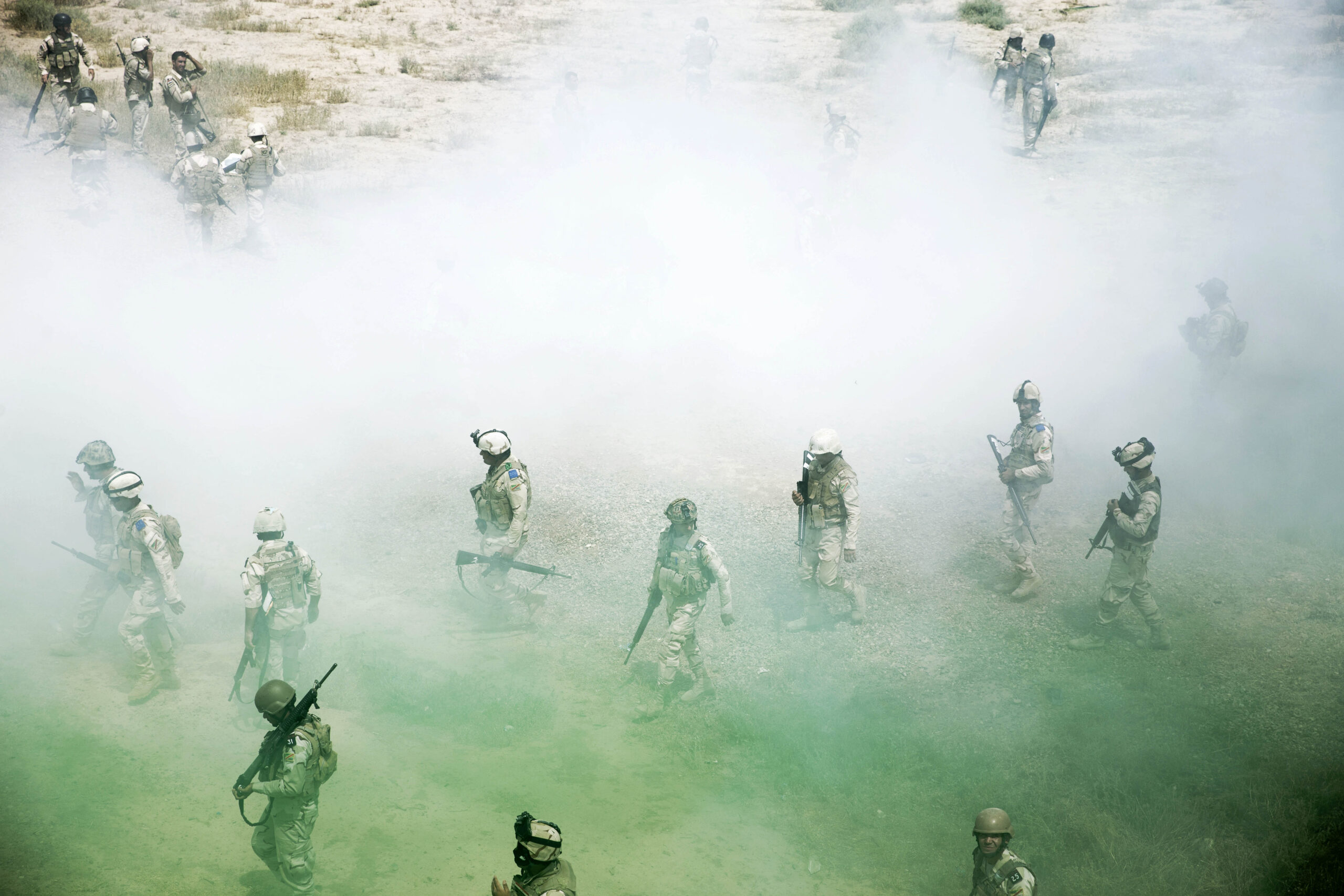 Iraqi Army soldiers walk off the range after completing a day's training during a Junior Leaders Course conducted by New Zealand Army personnel at the Taji Military Complex in Iraq. *** Local Caption *** New Zealand Army trainers from Task Group Taji have delivered eight weeks of instruction to Iraqi Army soldiers at the Taji Military Complex in Iraq. The Iraqi soldiers were participating in the Iraqi Army Non-Commissioned Academys Junior Leaders Course. The training packages included sessions of combat first aid, navigation, physical training, marksmanship and urban operations. Members of the Iraqi Army are being trained by Task Group Taji personnel from Australia and New Zealand at the Taji Military Complex in Iraq as part of the broader international Building Partner Capacity (BPC) mission. The training includes weapons handling, building clearances and obstacle breaching techniques, as well as training in the tactics, techniques and procedures for squad through to company-level operations for use in the fight against Daesh. Task Group Tajis BPC contribution is part of Australias broader Defence contribution to Iraq, codenamed Operation OKRA, which includes a Special Operations Task Group and an Air Task Group.