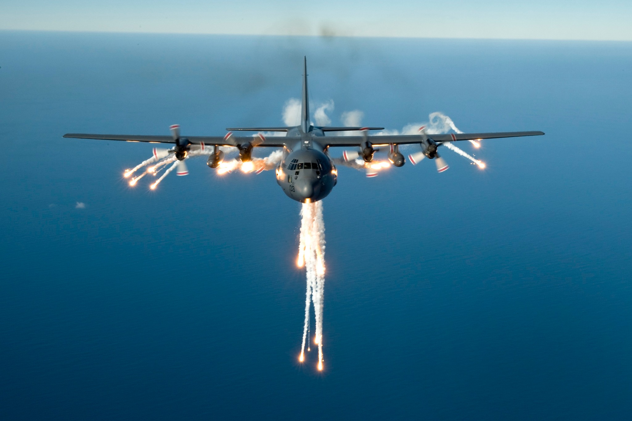 Hercules NZ7003 being photographed from N72002 conducting Flare trials, flight serial 4-1 in the M203/M204 area with the PW 118 Flare. Testing being conductor prior to Excercise Surfrider.