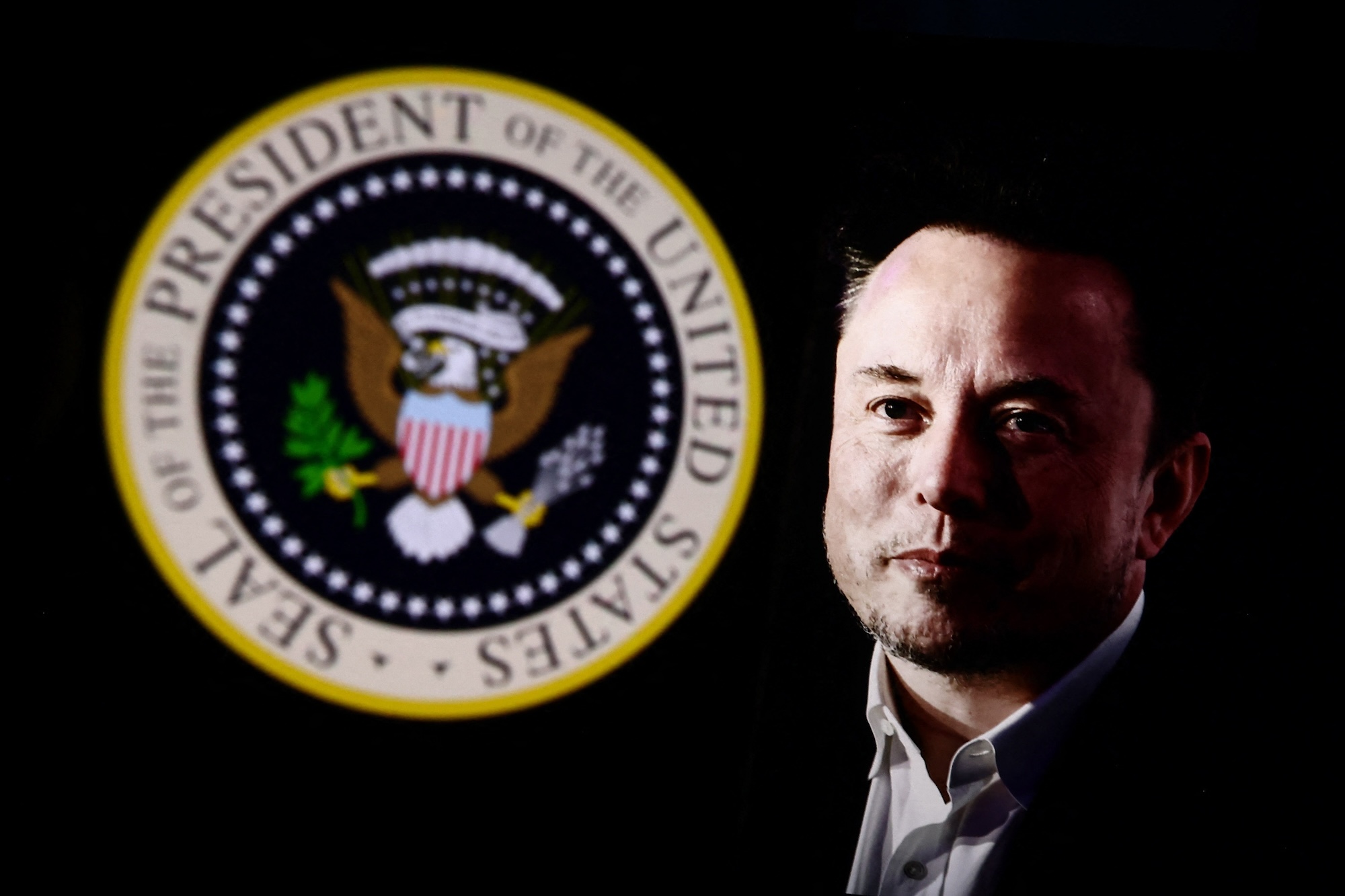 Portrait picture of Elon Musk with the seal of the president of the United State screened