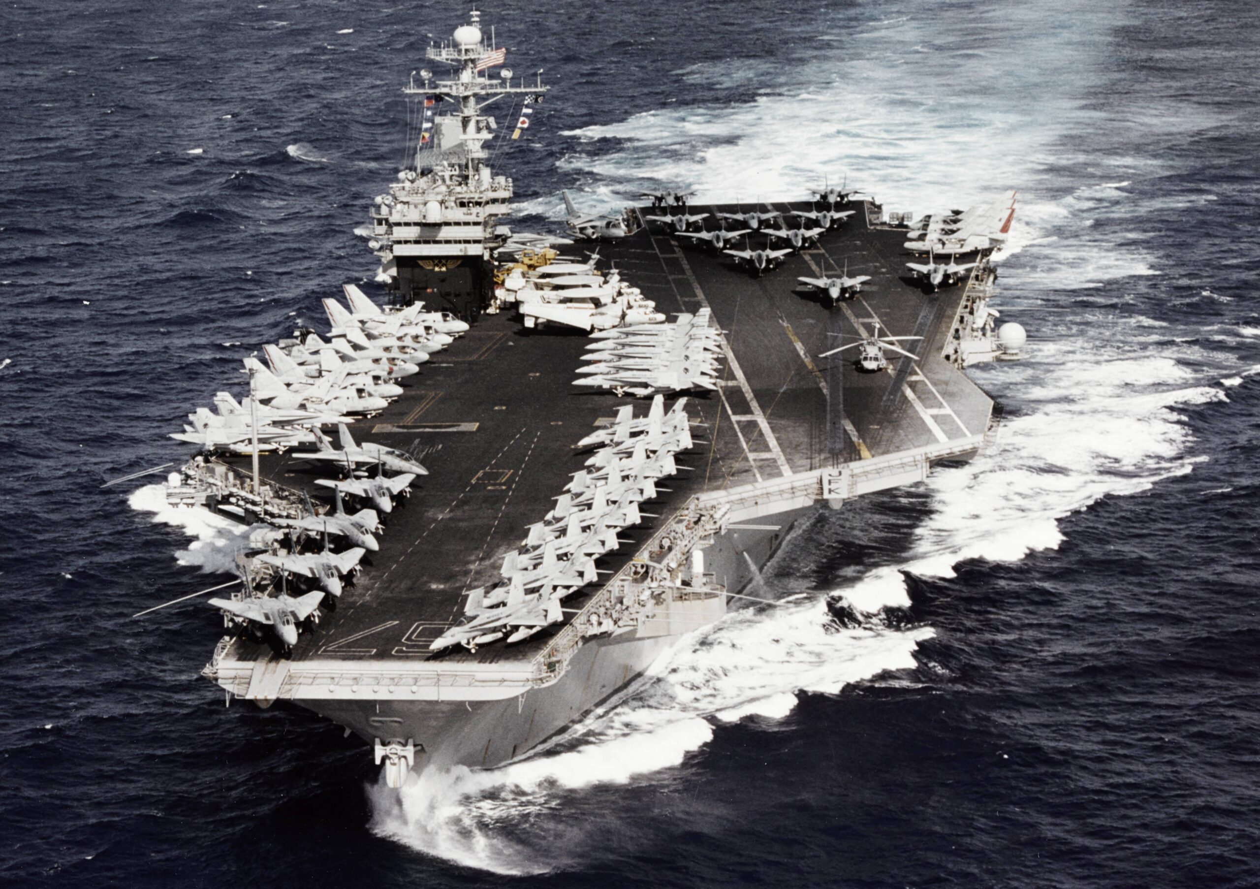 The USS John F. Kennedy (CV 67) conventionally-powered aircraft carrier
