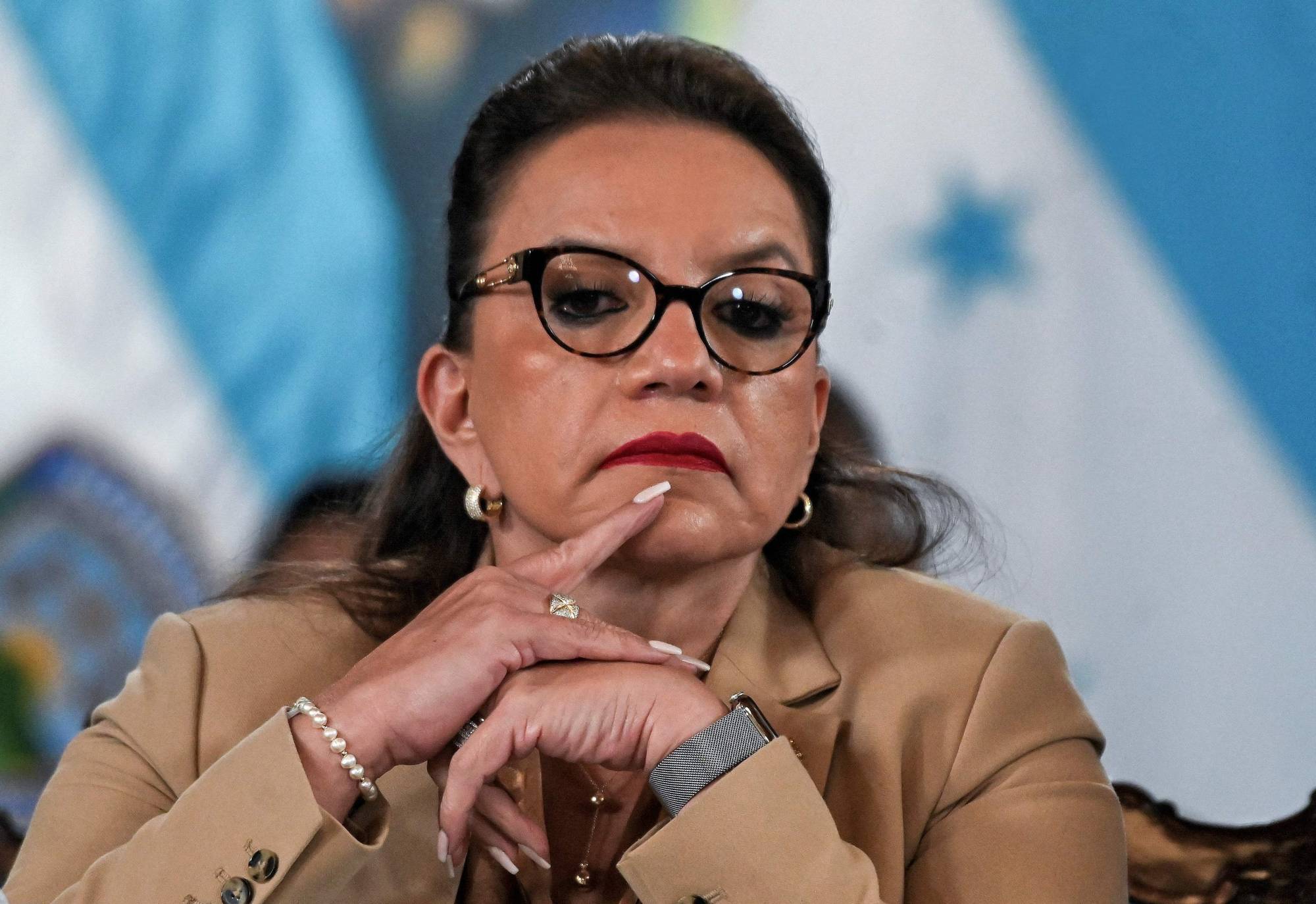 (FILES) In this file photo taken on November 24, 2022, Honduras' President Xiomara Castro gestures during the launching of the 