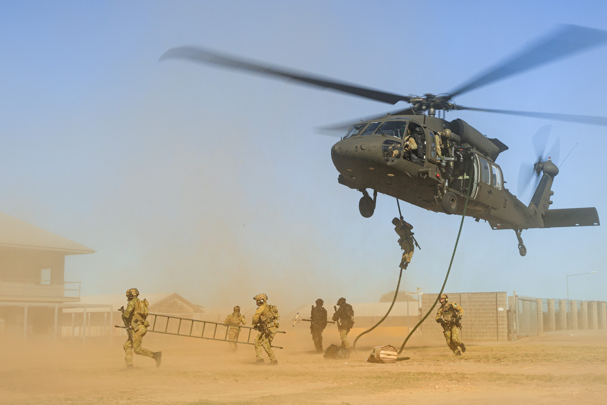 Australian Army soldiers and aviators conduct helicopter insertion and extraction training as part of UH-60M Black Hawk introduction into service activities. *** Local Caption *** In early 2023, Defence announced the Australian Governments decision to replace the Taipan Multi Role Helicopter (MRH90) with a fleet of 40 UH-60M Black Hawk Utility Helicopters. Currently, 10 Black Hawks have been delivered to Australia, with all 40 aircraft expected by 2030. The UH-60M Black Hawk provides Army with the modern, credible and sustainable Aviation capability it needs to meet the contemporary challenges of warfare. The UH-60M Black Hawk fleet is being initially established in Holsworthy, New South Wales and is planned to expand into Oakey, Queensland next year.