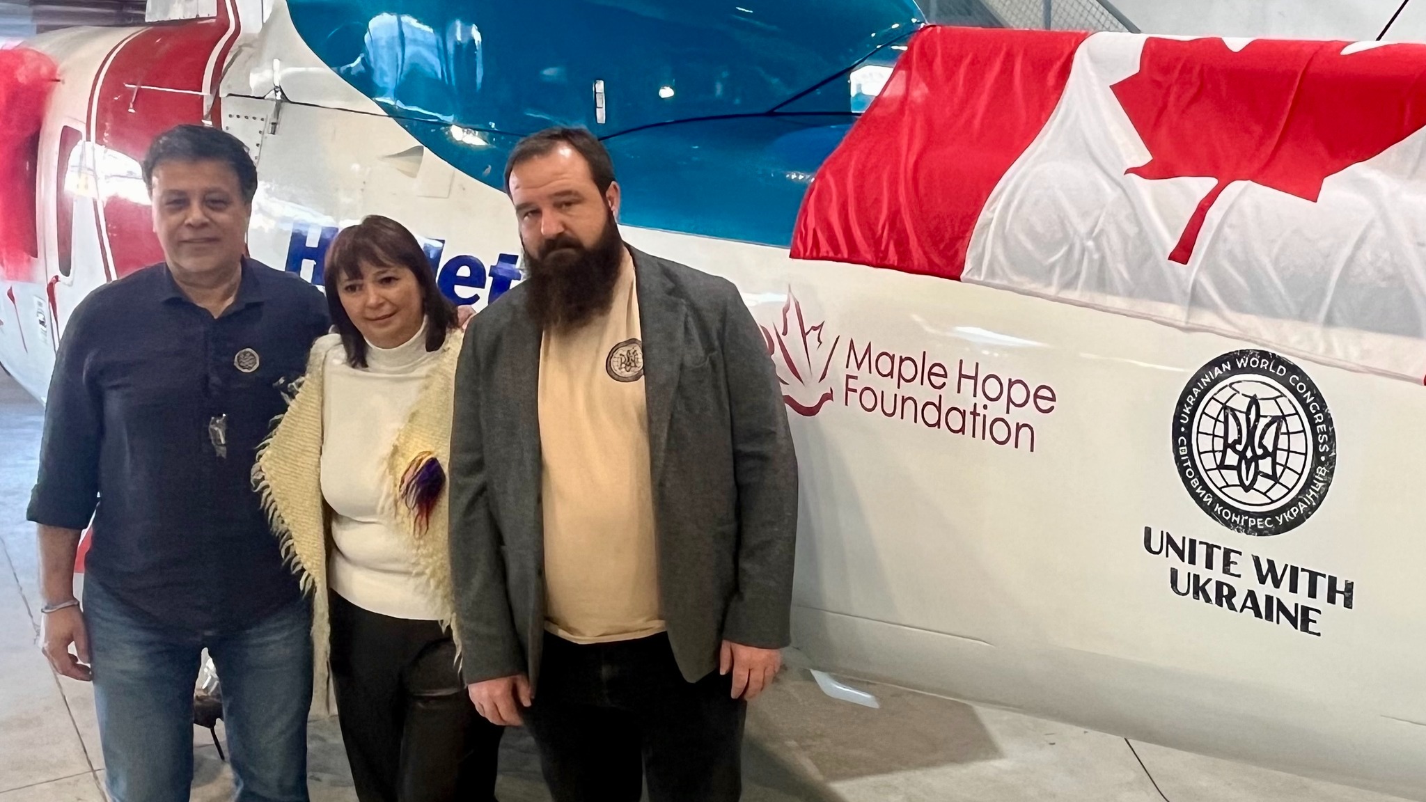 Danny Sitnam, Helijet CEO, Svitlana Kominko, Co-Founder and CEO of Maple Hope Foundation, Andrew Potichnyj, Director Unite With Ukraine with Sikorsky S76 (l-r)