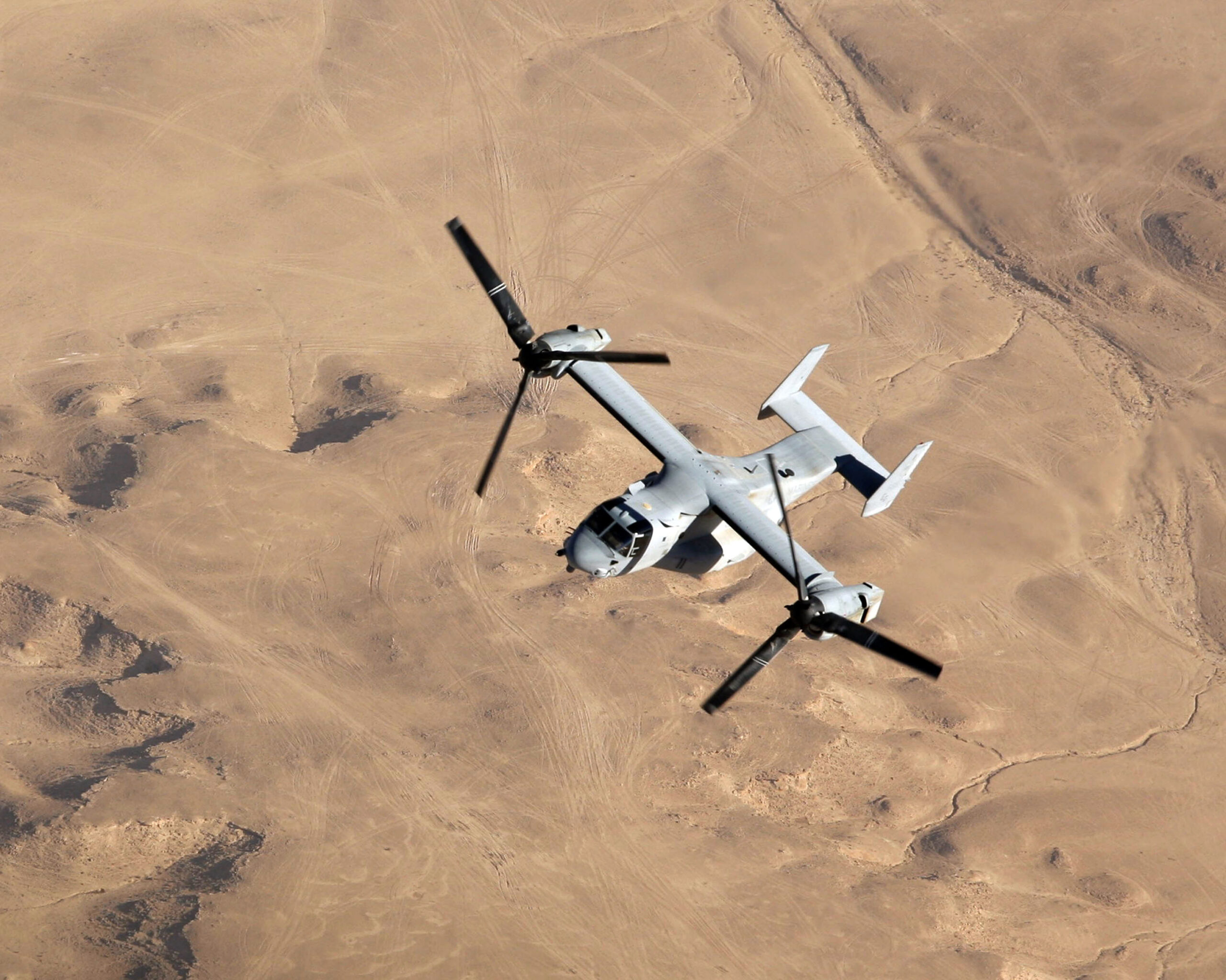 An MV-22B Osprey with Marine Medium Tilt rotor Squadron-263, flies over the Al Anbar province of Iraq during a mission out of Al Asad Air Base.