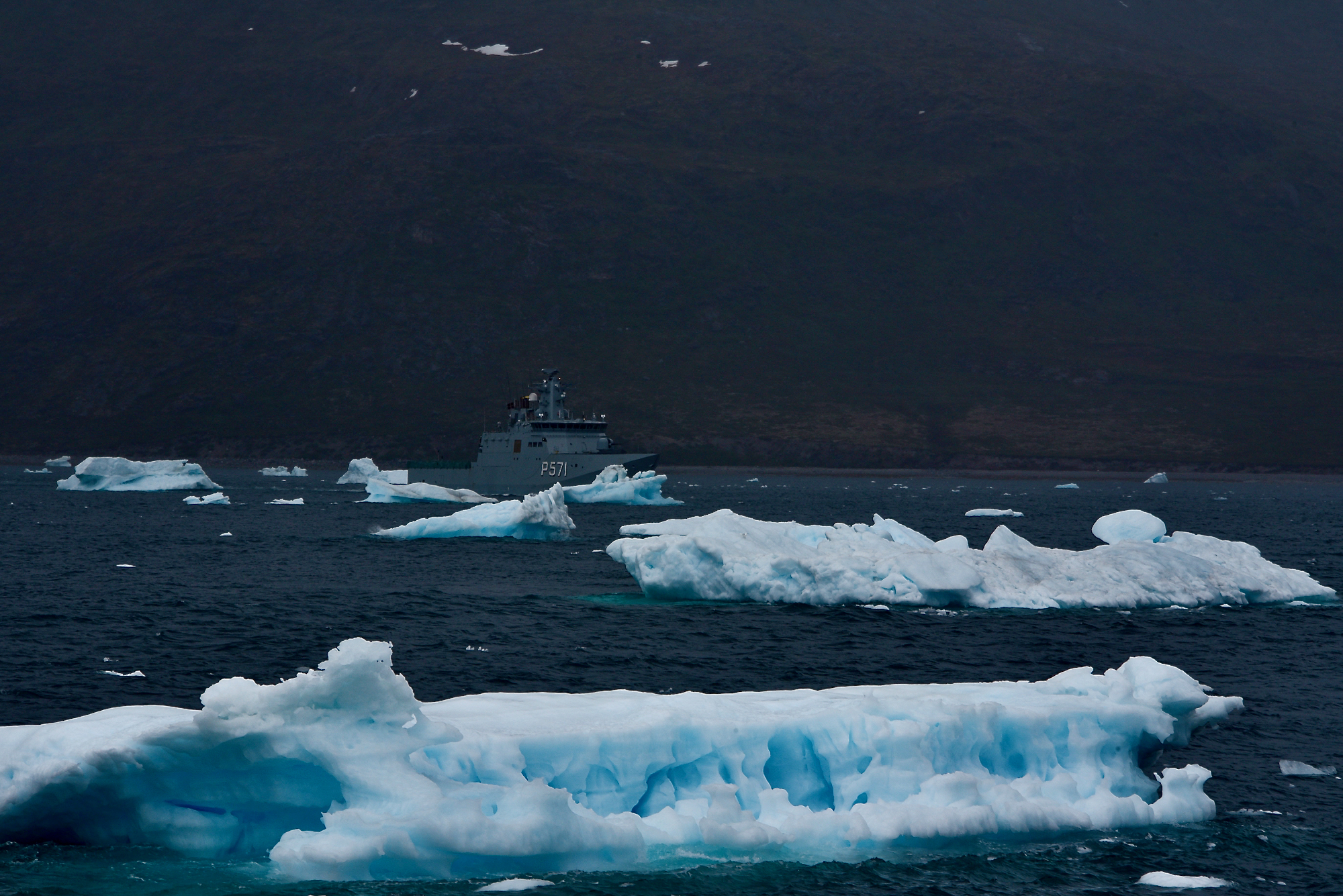 The USCGC Maple (WLB 207) crew participate in a search and rescue exercise with the HDMS Ejnar (P571), a Royal Danish Navy Knud Rasmussen-class patrol vessel in Godthaab Fjord, Greenland, June 23, 2021. Deployed forces demonstrated U.S. Coast Guard capabilities to build partner capacity and expertise in search and rescue, incident management, and marine environmental response. These efforts solidify key strategic relationships while achieving mutual Danish, Greenlandic, and U.S. goals in the North American Atlantic Arctic and Northwest Atlantic Ocean. (U.S. Coast Guard photo by Petty Officer 3rd Class Jose Hernandez)
