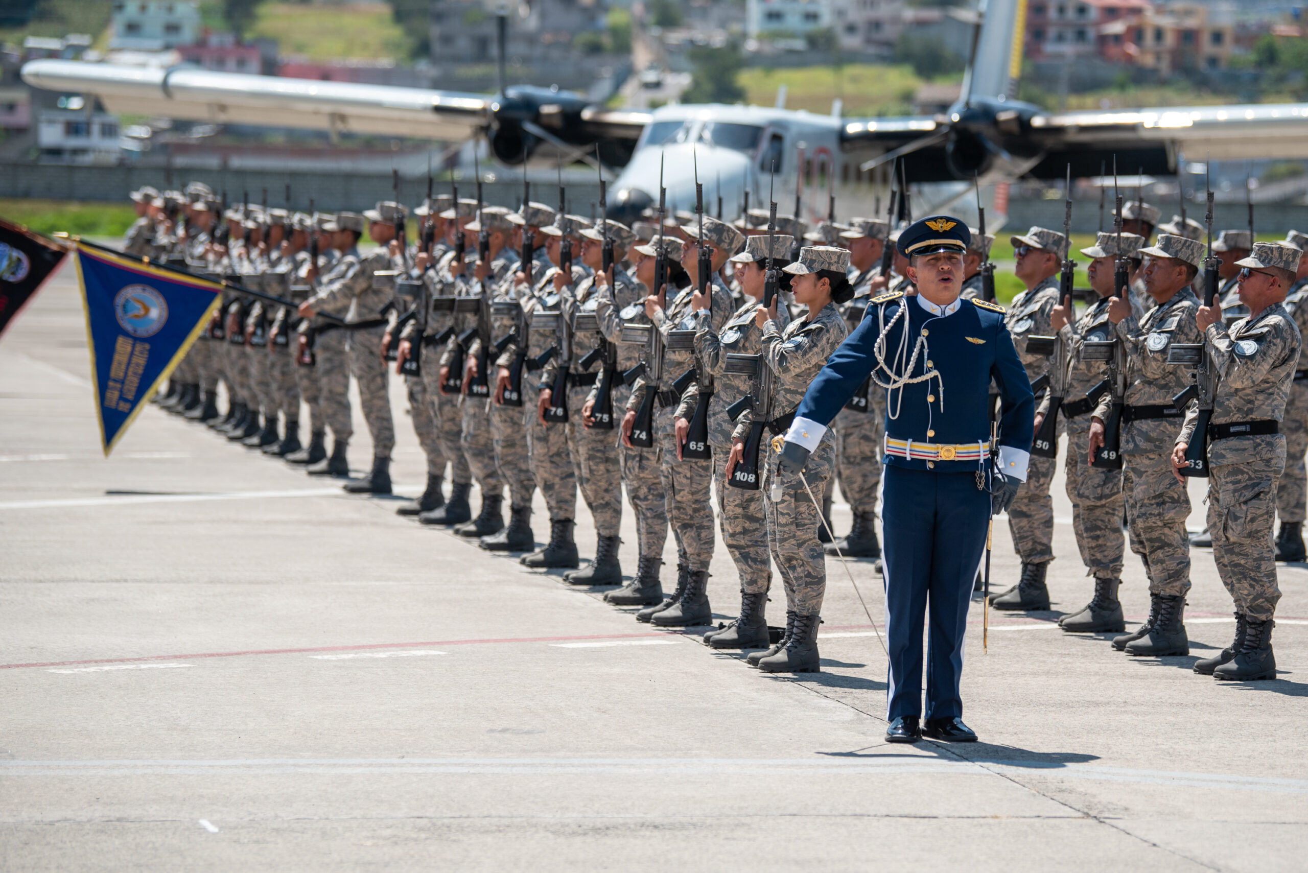Ecuadorian Armed Forces members attend a ceremony welcoming the arrival of a C-130H Hercules to the Ecuadorian Air Force in Latacunga, Ecuador, March 25, 2024. The ceremony, Ecuadorian Armed Forces members.