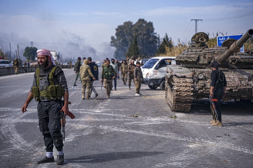Battles take place between the new Syrian government’s Defense Ministry forces and the forces loyal to Bashar Assad on March 7, 2025, in outskirts of Jableh, Latakia countryside, Syria.