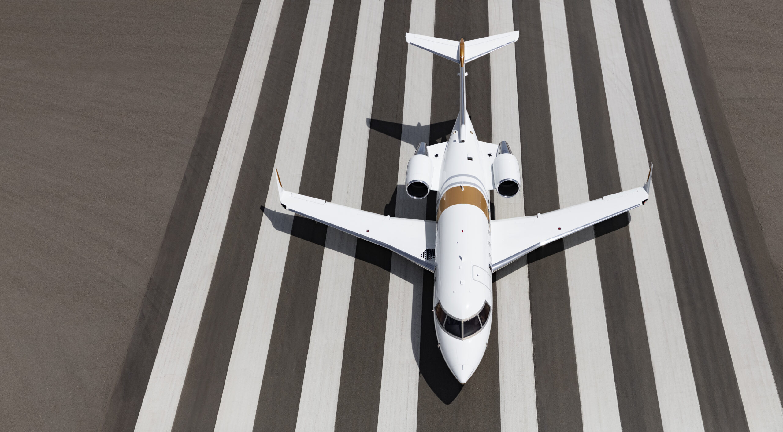 Bombardier Challenger 650 photographed on May 9, 2019 from Wolfe Air Learjet 25B from KTRM