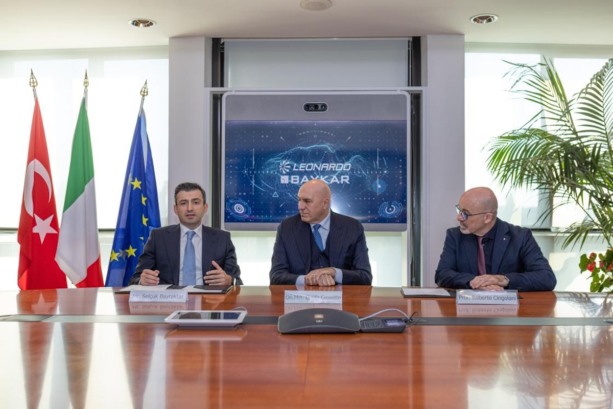 Baykar Chairman and CTO Selçuk Bayraktar, Italian defense minister Guido Crosetto, and Leonardo CEO and General Manager Roberto Cingolani sign a joint venture to produce unmanned aerial systems.