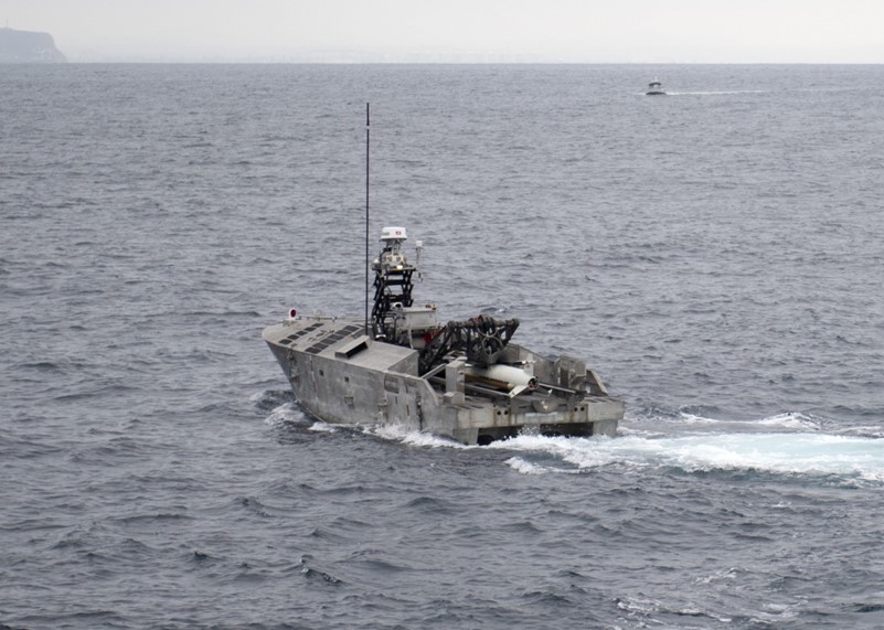 US Navy Mine Countermeasures Unmanned Surface Vehicle in Minehunt configuration completing sortie modes, including shallow and deep search, pruning, and Electro-Optic Identification