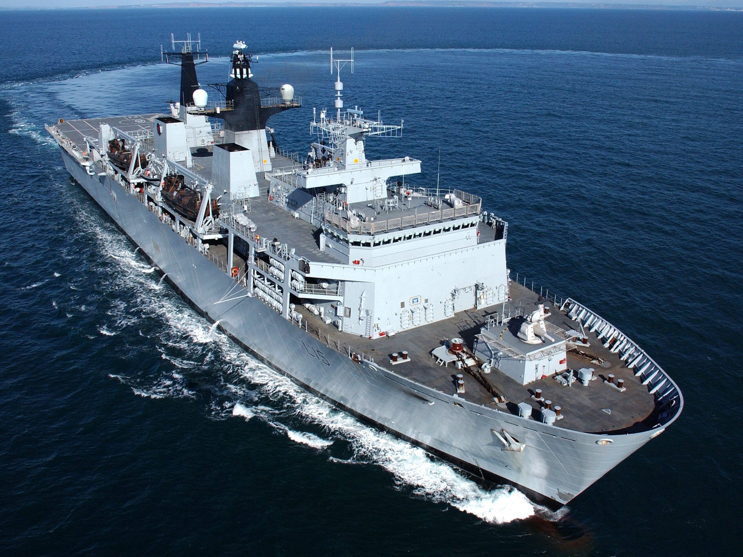 HMS Bulwark takes a hard turn to port, during exercises off Plymouth Sound.