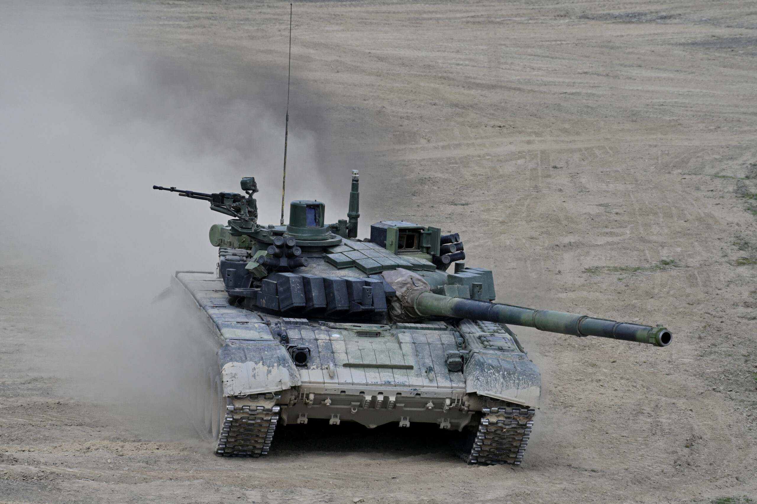 Czech Land Forces soldiers, assigned to 7th Mechanized Brigade, maneuver a T-72 tank during Immediate Response 24 at the Libava Training Area, Czech Republic, May 10, 2024. DEFENDER is a U.S. European Command scheduled, U.S. Army Europe and Africa conducted exercise that consists of Saber Strike, Immediate Response, and Swift Response. DEFENDER 24 is linked to NATO’s Steadfast Defender exercise, and DoD’s Large Scale Global Exercise, taking place from 28 March to 31 May. DEFENDER 24 is the largest U.S. Army exercise in Europe and includes more than 17,000 U.S. and 23,000 multinational service members from more than 20 Allied and partner nations, including Croatia, Czech Republic, Denmark, Estonia, Finland, France, Germany, Georgia, Hungary, Italy, Latvia, Lithuania, Moldova, Netherlands, North Macedonia, Norway, Poland, Romania, Slovakia, Spain, Sweden, and the United Kingdom. (U.S. Army photo by Staff Sgt. Randis Monroe)