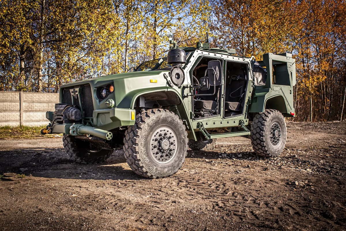 A joint light tactical vehicle parked outdoors