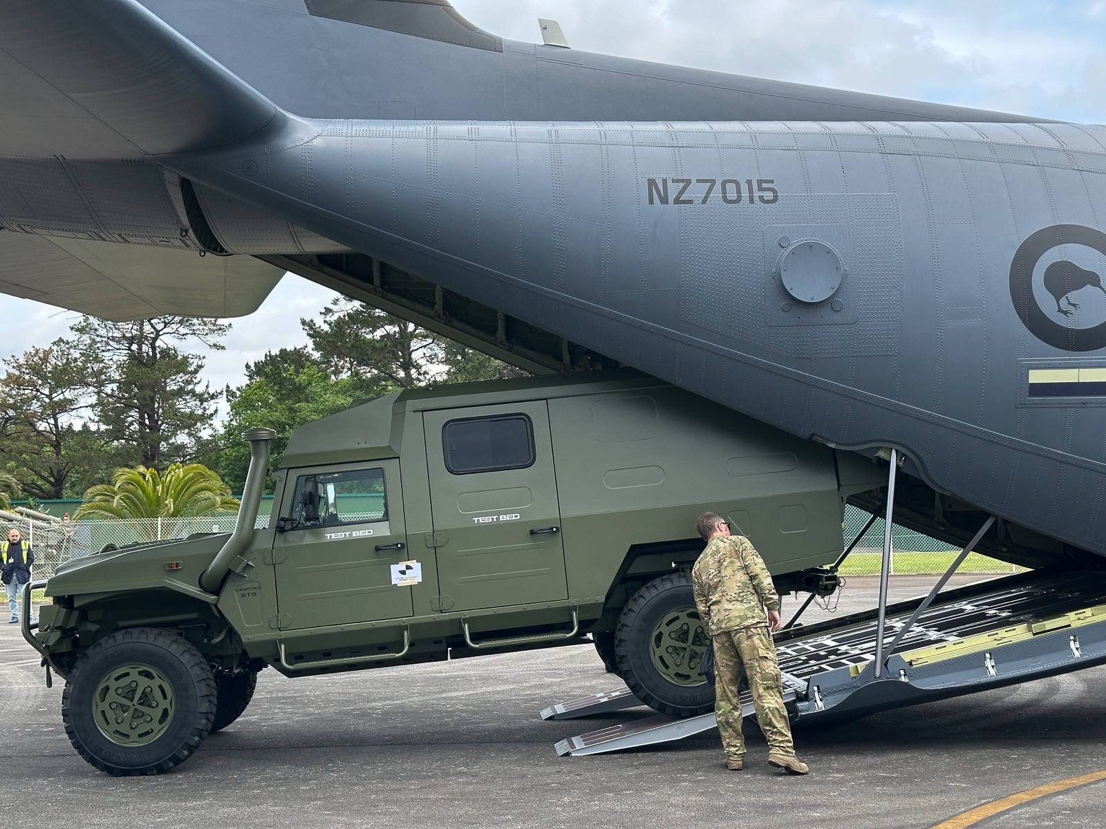 A VAMTAC ST5 4x4 vehicle being unloaded from a Super Hercules C-130J-30 aircraft. Photo: New Zealand Defence Force