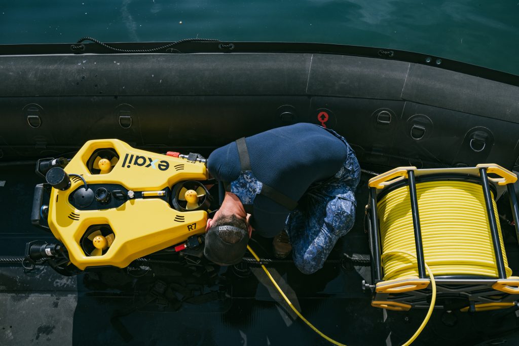 Soldier deploys Exail R7 underwater drone for mine countermeasures test. Photo: Spanish Navy