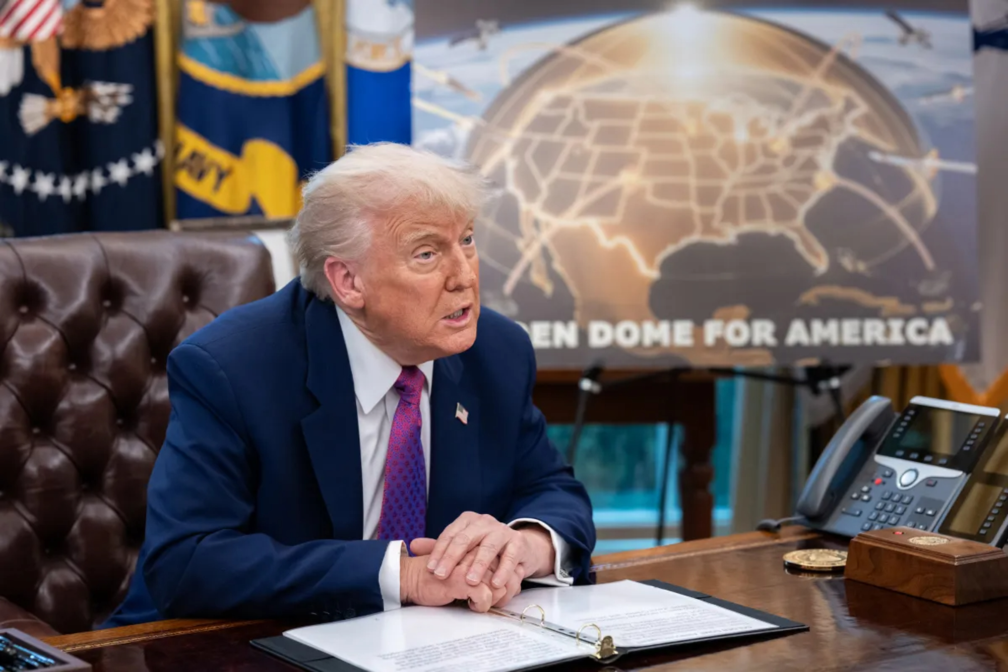 US President Donald Trump presenting the government's 'Golden Dome' missile defense plan at the Oval Office