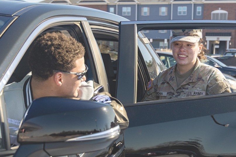 Soldier hails a ride-share car